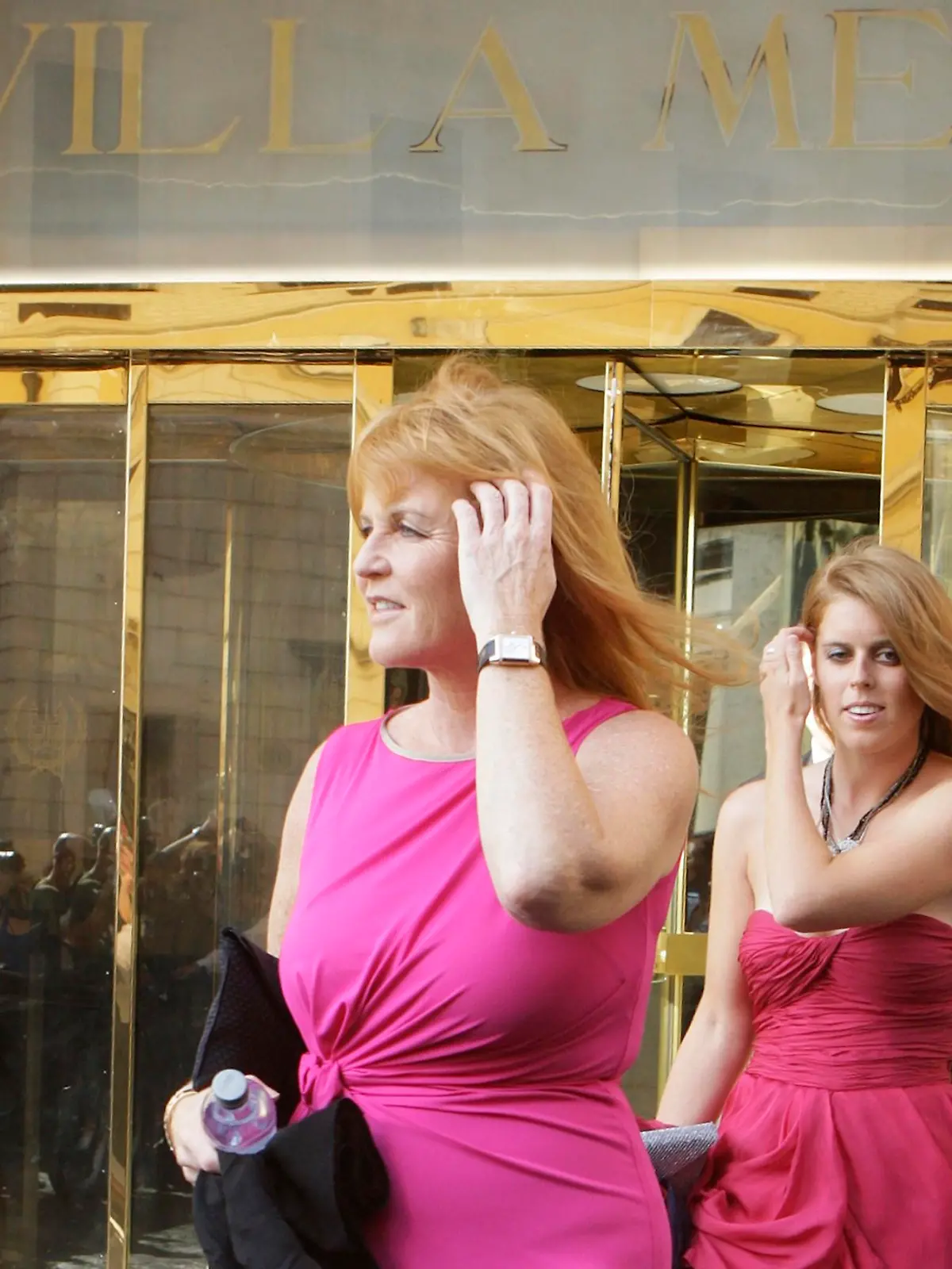 Sarah Ferguson (L), Britain's Duchess of York, and her daughter Princess Beatrice leave Hassler Hotel in downtown Rome, August 27, 2011. Petra Ecclestone, daughter of Formula One supremo Bernie, will marry her boyfriend of five years, James Stunt, at the Castello Odescalchi castle in Bracciano, near Rome on Saturday. REUTERS/Remo Casilli (ITALY - Tags: ENTERTAINMENT ROYALS)