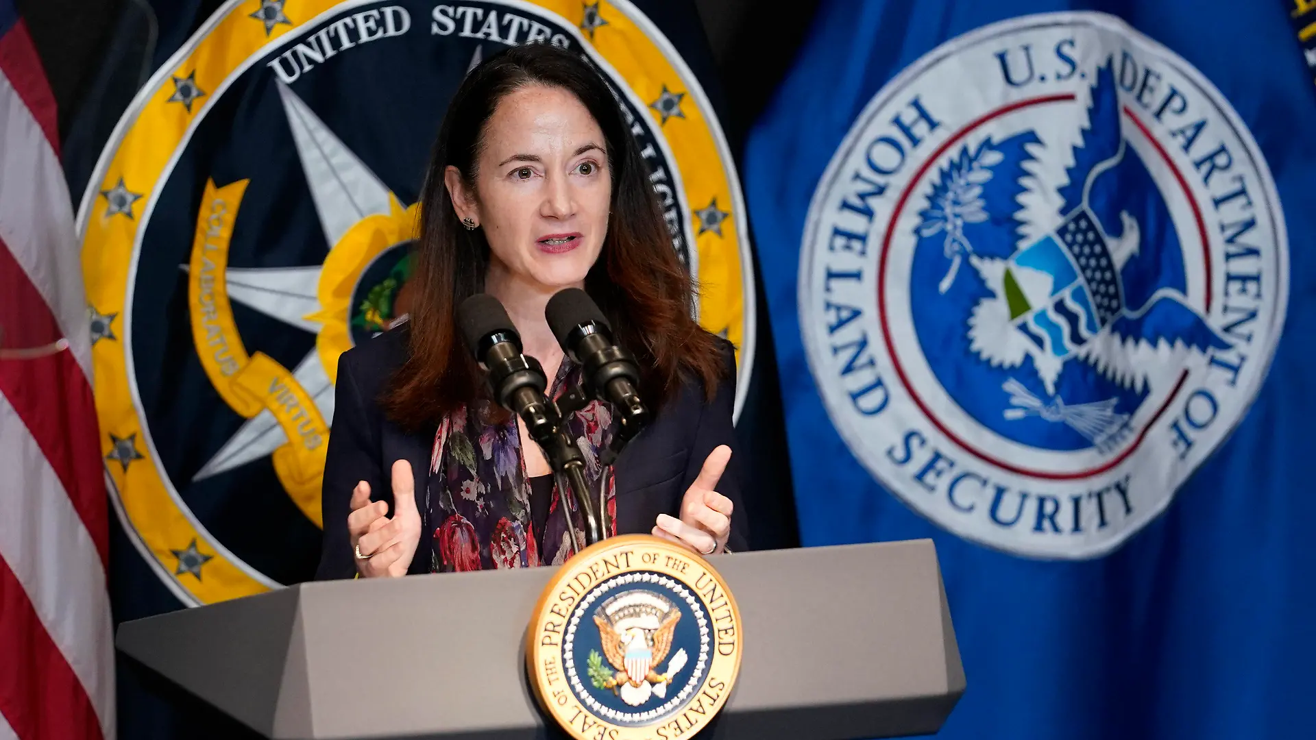 FILe - Director of National Intelligence Avril Haines introduces President Joe Biden during a visit to the Office of the Director of National Intelligence in McLean, Va., on July 27, 2021. U.S. intelligence agencies say they likely won't ever be able to conclude whether COVID-19 spread by animal-to-human transmission or leaked from a lab. The Director of National Intelligence issued a paper Friday, Oct. 29, that elaborates on findings released in August of a 90-day review ordered by Biden. (AP Photo/Susan Walsh, File)
