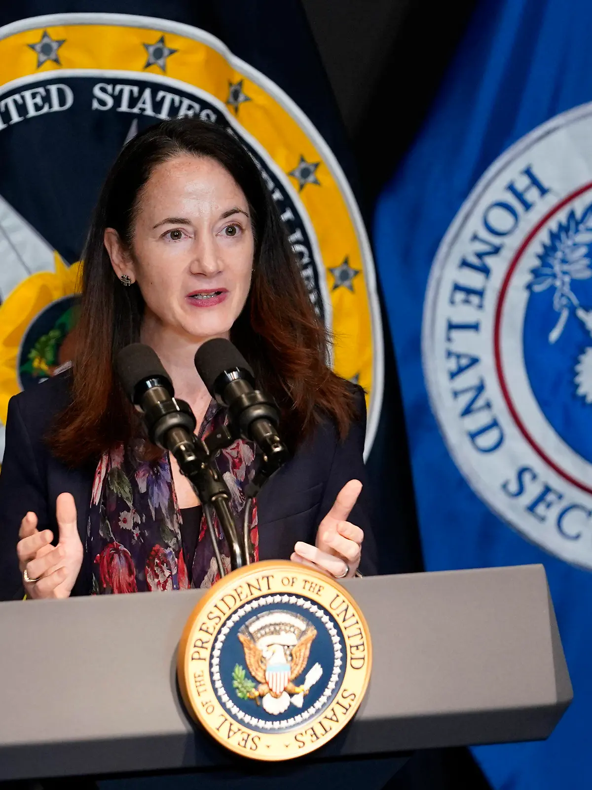 FILe - Director of National Intelligence Avril Haines introduces President Joe Biden during a visit to the Office of the Director of National Intelligence in McLean, Va., on July 27, 2021. U.S. intelligence agencies say they likely won't ever be able to conclude whether COVID-19 spread by animal-to-human transmission or leaked from a lab. The Director of National Intelligence issued a paper Friday, Oct. 29, that elaborates on findings released in August of a 90-day review ordered by Biden. (AP Photo/Susan Walsh, File)
