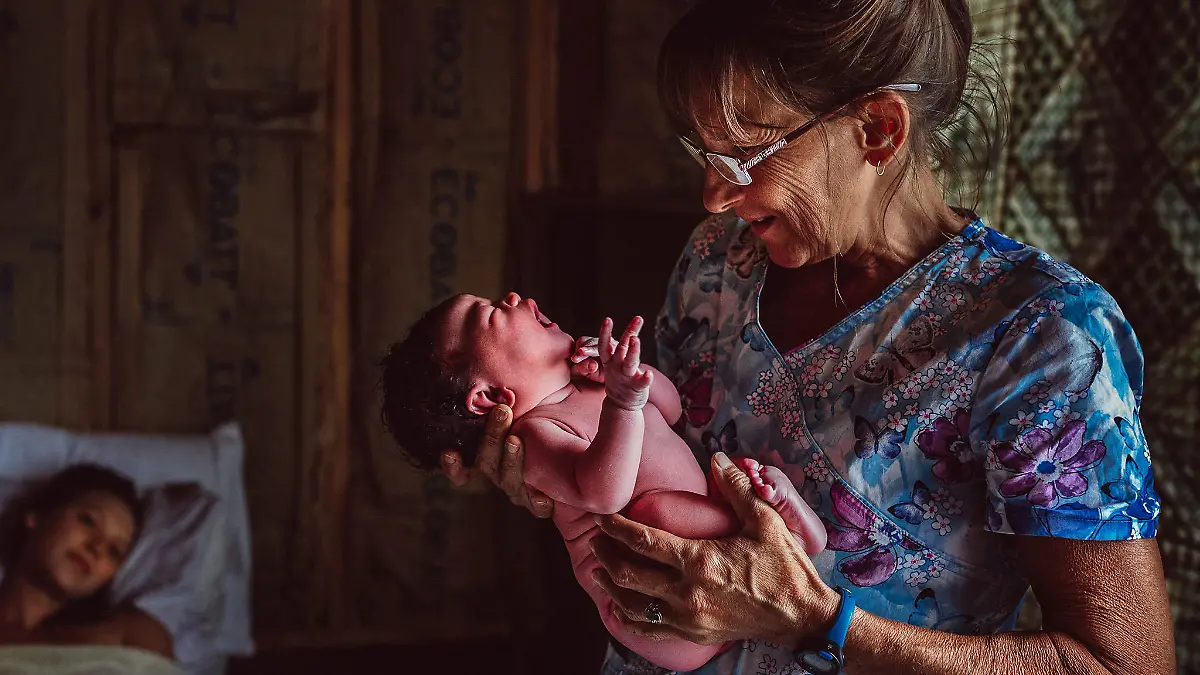 CATERS NEWS (PICTURED - Pic by COLBY TULACHNANH) - This powerful gallery showcases the winners of this year's best birth photographs from around the world. These stunning birth images have been crowned the best on the planet in the annual Birth Photographer of the Year [BPOTY] awards, in collaboration with Atkins Lab. The contest was founded by world renowned and award-winning birth photographer Lacey Barratt as a way to further legitimise the stunning and intricate art of birth photography. The 34-year-old from Melbourne, Victoria, Australia, has been a passionate birth photographer for 11 years and was one of fourteen experienced judges to pick the winners of the awards. SEE CATERS COPY