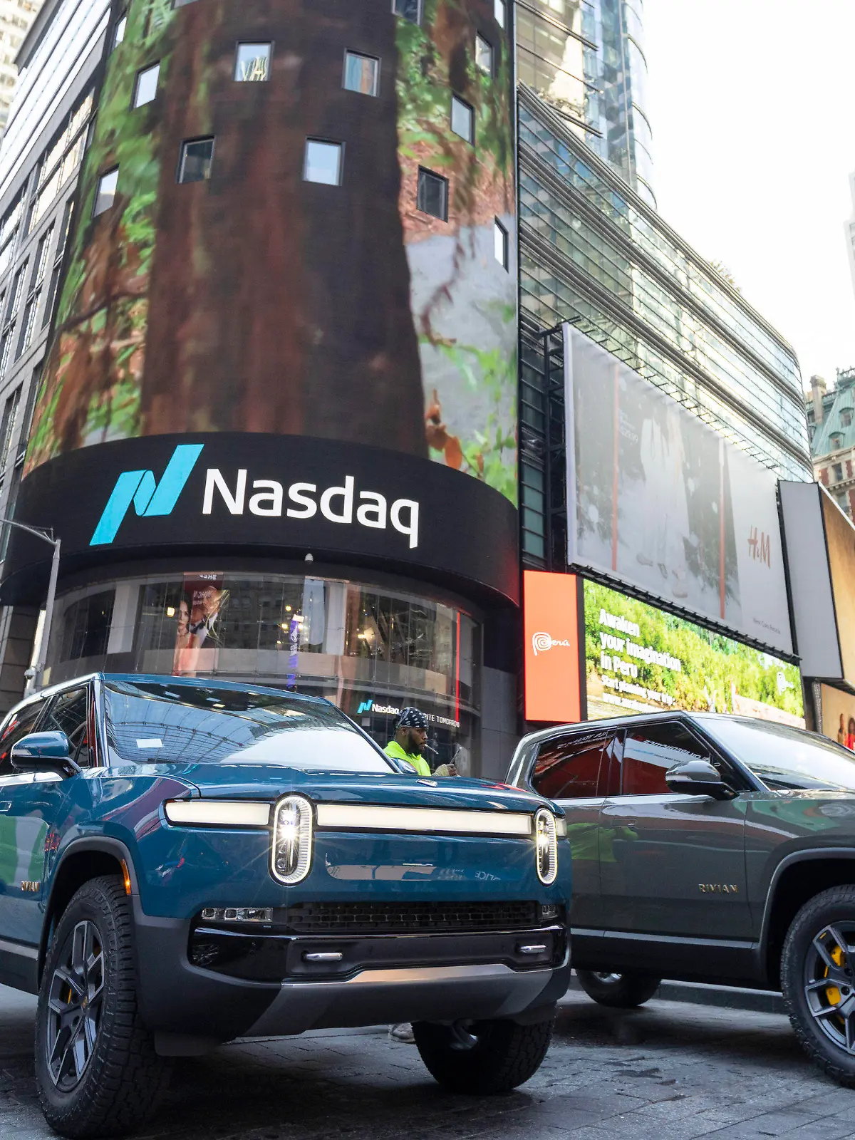 IMAGE DISTRIBUTED FOR RIVIAN AUTOMOTIVE, LLC - Rivian R1T all-electric truck in Times Square on listing day, on Wednesday, Nov. 10, 2021 in New York. (Ann-Sophie Fjello-Jensen/AP Images for Rivian Automotive, LLC)