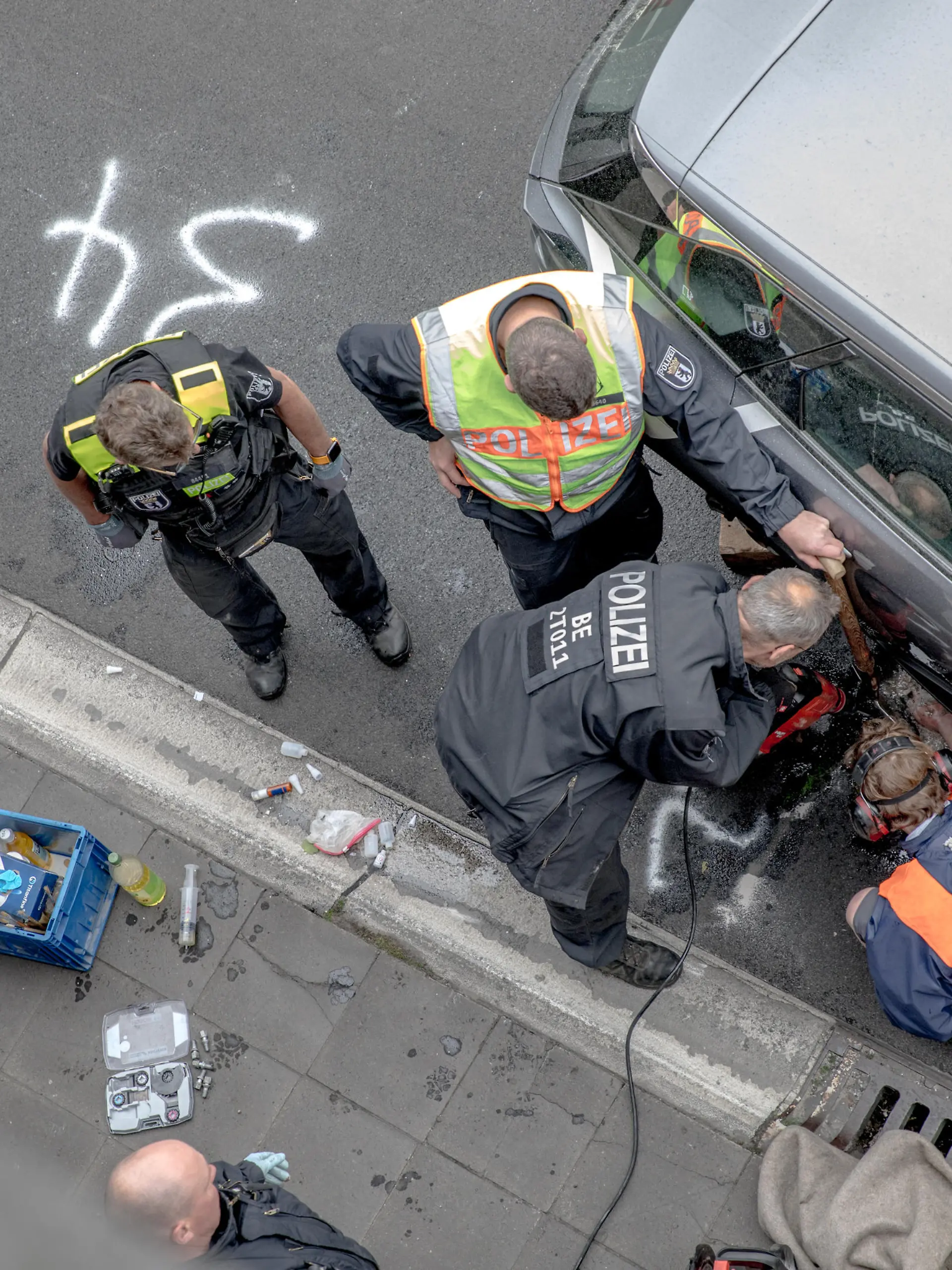 May 23, 2023, Berlin, Germany: On May 23, 2023, the climate activists group ''Letzte Generation'' (Last Generation) blocked the A100 freeway. They adhered themselves to rental cars and a rental van using glue. They also attached themselves to the tires of vehicles. As a result, the police had to deploy heavy equipment near the Paulsborner BrÃ¼cke (Paulsborn Bridge) to remove the activists. The blockade on the A100 is one of the group's actions aimed at pressuring the German government to take more robust measures against the climate crisis. The activists of the ''Letzte Generation'' employ methods of civil disobedience to enforce their demands. The group has gained attention and faced criticism due to using glue to attach themselves to road surfaces during protests. However, the public's response to their actions has been largely negative. These blockades often lead to legal convictions, mainly for coercion, in Germany. Many activists have been fined. (Credit Image: © Michael Kuenne/PRESSCOV via ZUMA Press Wire) / action press