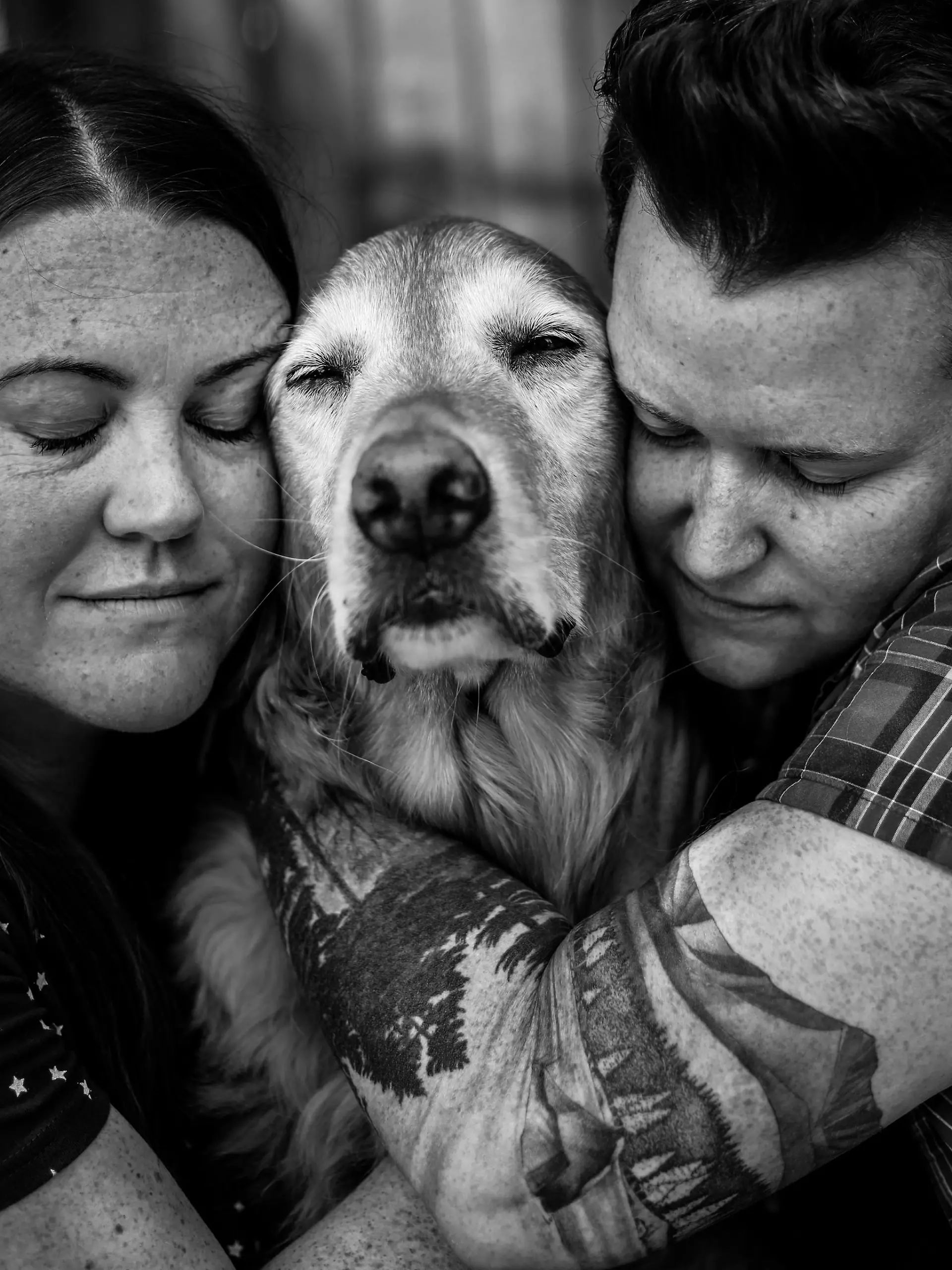 Jill and Amy Barkley-Roy hug Winston the 12 year old golden retriever. See Animal News copy AN-SmithDogs: These heartbreaking pictures show the incredible bond between pets and their owners as they prepare to say goodbye for the very last time. The beautiful yet bitter-sweet images were captured to mark the end of the pets’ lives as families prepared to lose their faithful friends. The poignant pictures, captured in powerful black-and-white, were so popular when shared on social media that the photographer had offers to fly around the world. 