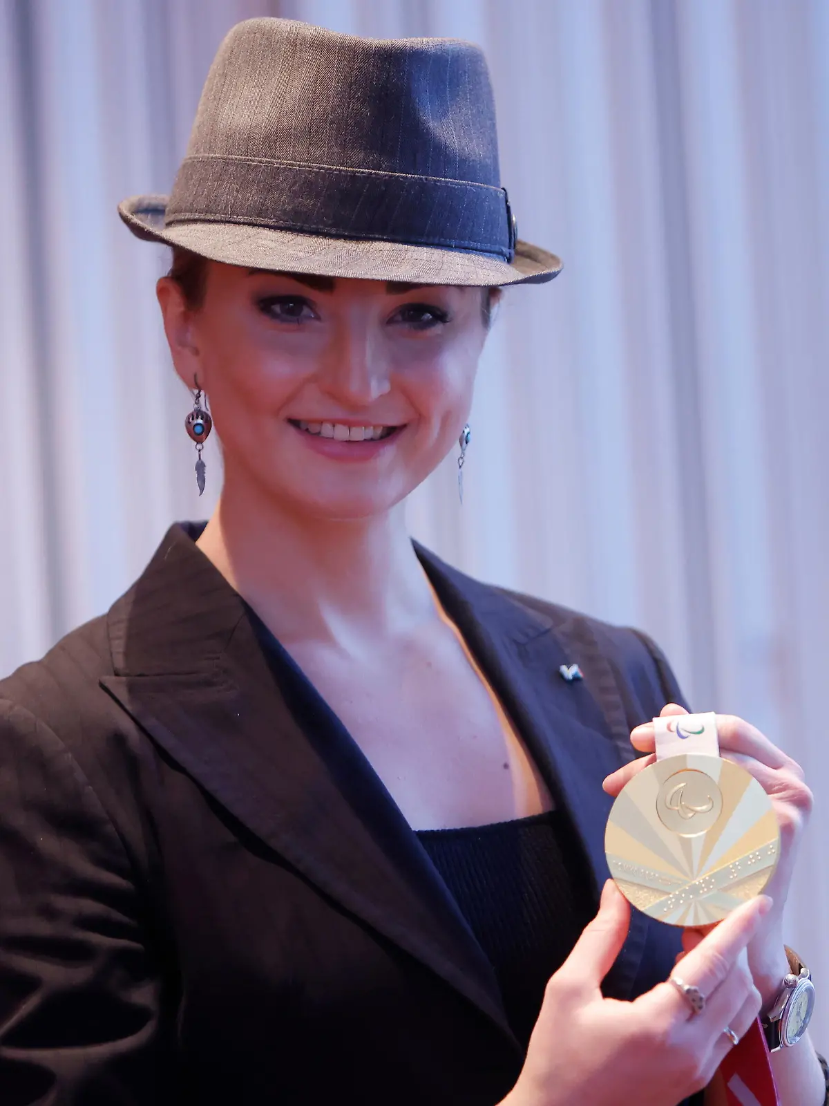 Elena Krawzow poses with her gold medal as she receives the Silver Laurel Leaf award during an award ceremony for the Germany's medal-winners of the Tokyo 2020 Olympics in Berlin, Germany, November 8, 2021. REUTERS/Michele Tantussi