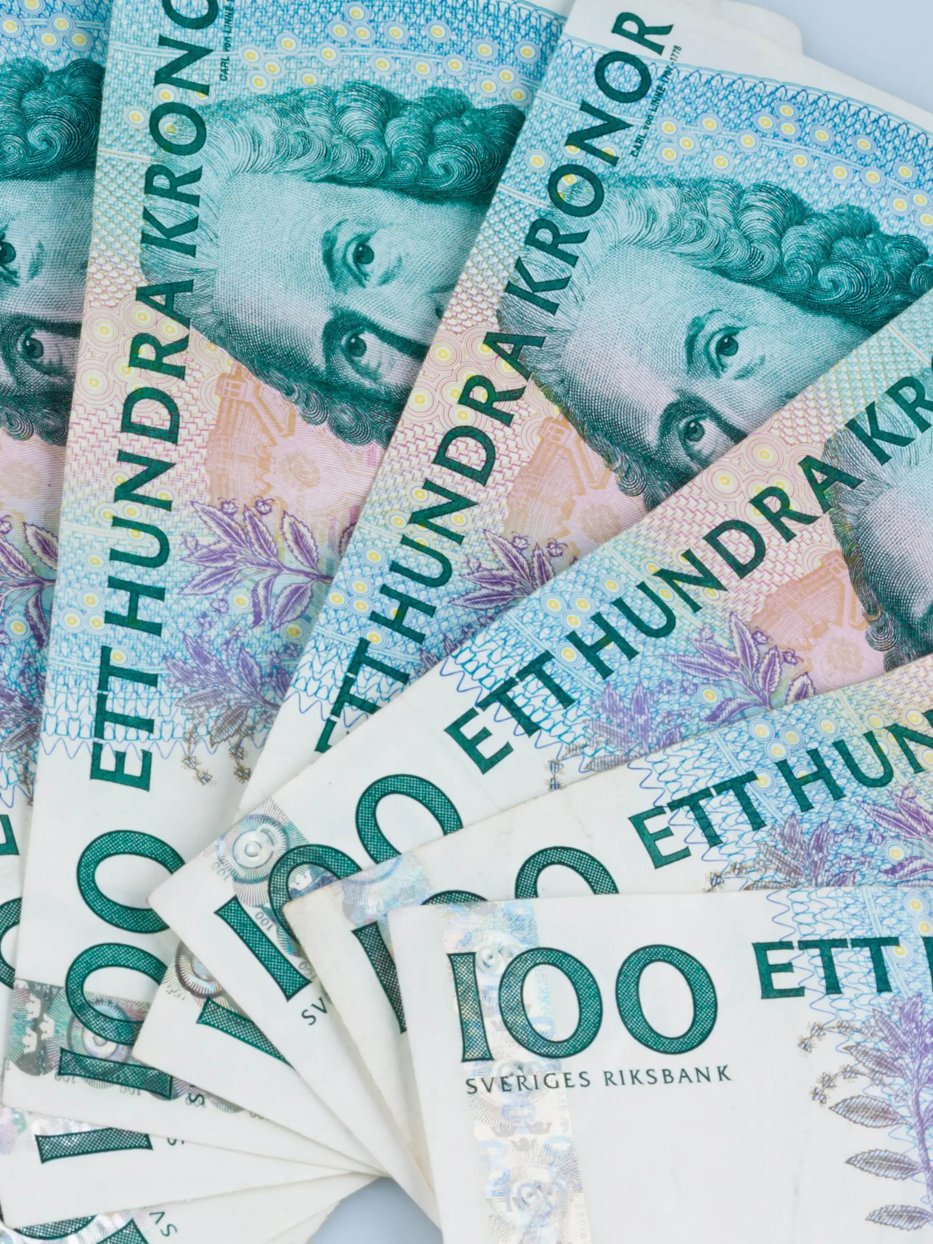 Schwedische Kronen, die Währung Schwedens. Liegen als Fächer nebeneinander. / Swedish krona, the currency of Sweden. Lie next to each other as a fan. 