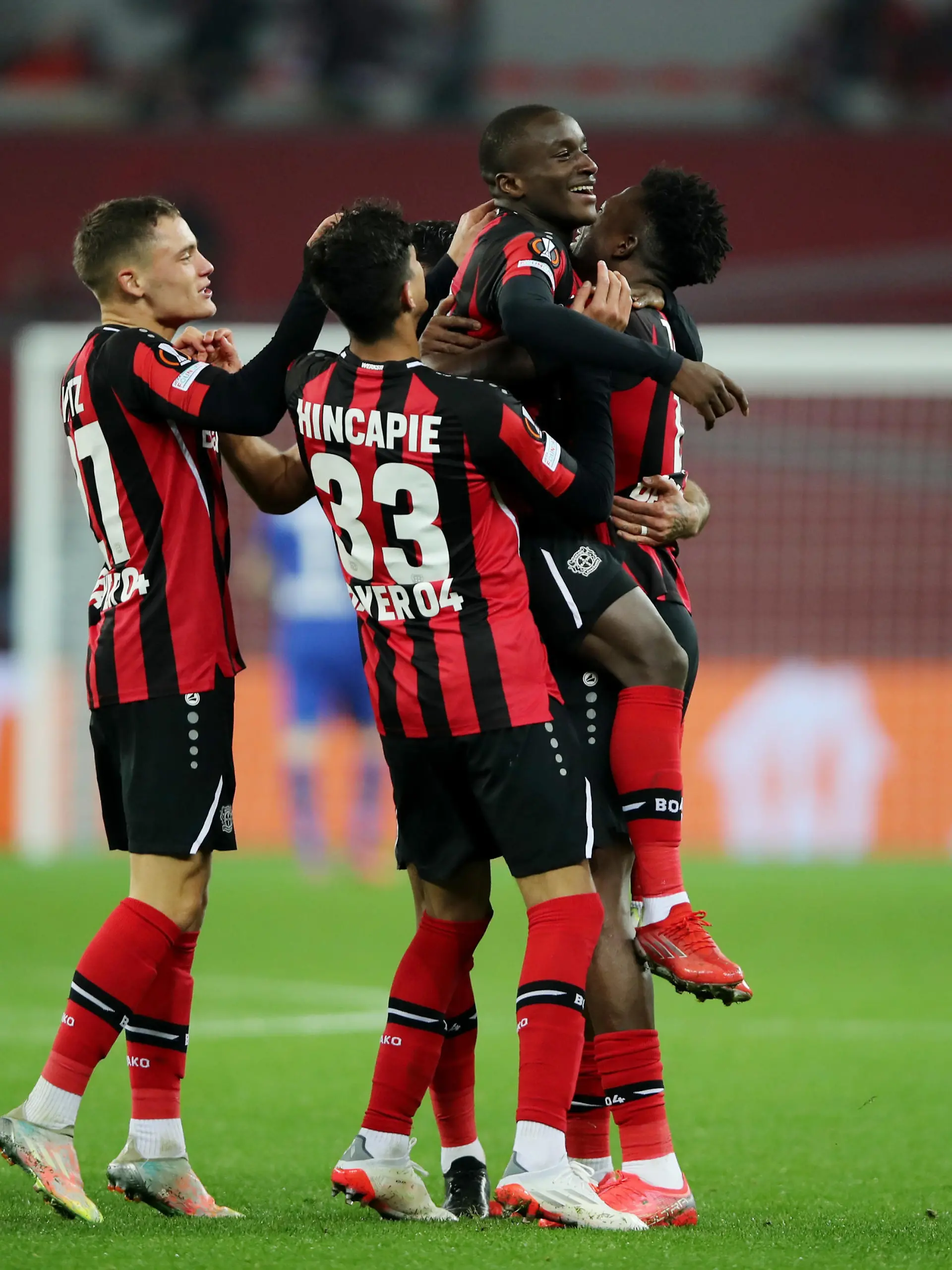 Soccer Football - Europa League - Group G - Bayer Leverkusen v Real Betis - BayArena, Leverkusen, Germany - November 4, 2021 Bayer Leverkusen's Moussa Diaby celebrates scoring their second goal with teammates REUTERS/Thilo Schmuelgen