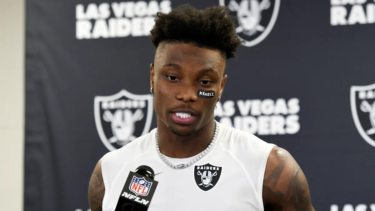 Las Vegas Raiders wide receiver Henry Ruggs III (11) meets with the media following an NFL football game against the Pittsburgh Steelers in Pittsburgh, Sunday, Sept. 19, 2021. The Raiders won 26-17. (AP Photo/Don Wright)