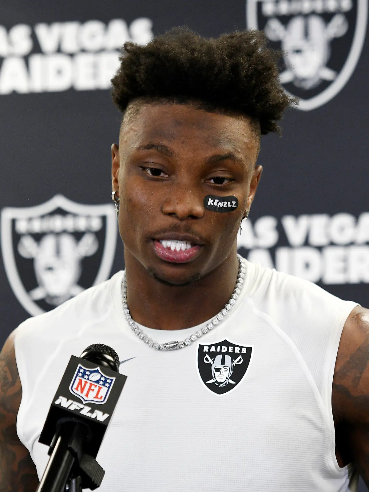 Las Vegas Raiders wide receiver Henry Ruggs III (11) meets with the media following an NFL football game against the Pittsburgh Steelers in Pittsburgh, Sunday, Sept. 19, 2021. The Raiders won 26-17. (AP Photo/Don Wright)
