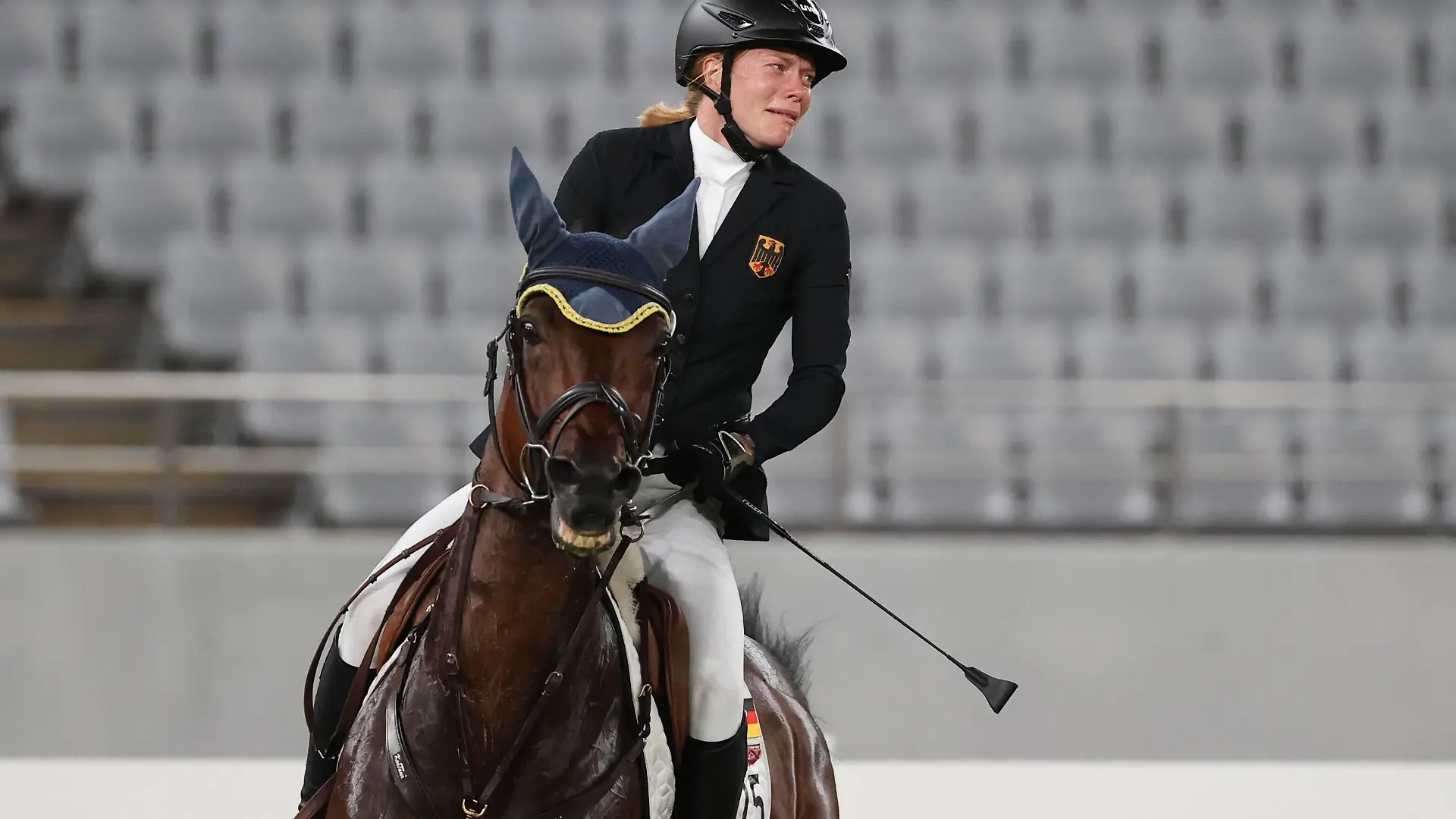 TOKYO, JAPAN - AUGUST 6, 2021: Germany s Annika Schleu competes in the women s individual riding show jumping event during the Modern pentathlon, moderner Fünfkampf competition at the 2020 Summer Olympic Games, Olympische Spiele, Olympia, OS at Tokyo Stadium. Stanislav Krasilnikov/TASS PUBLICATIONxINxGERxAUTxONLY TS10BA81