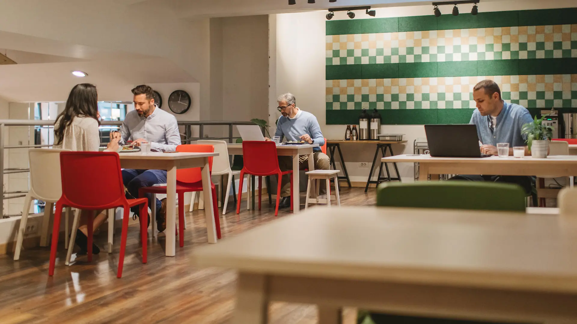 Group of  business people on lunch break in office canteen.