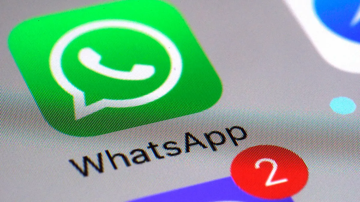 FILE - The WhatsApp communications app is seen on a smartphone, in New York, March 10, 2017. WhatsApp is allowing users to do just that, for the first 15 minutes after they send a message. The popular chat app announced in a blog post Monday, May 22, 2023, that users can correct misspellings, add more details or otherwise change what they have messaged. (AP Photo/Patrick Sison, File)