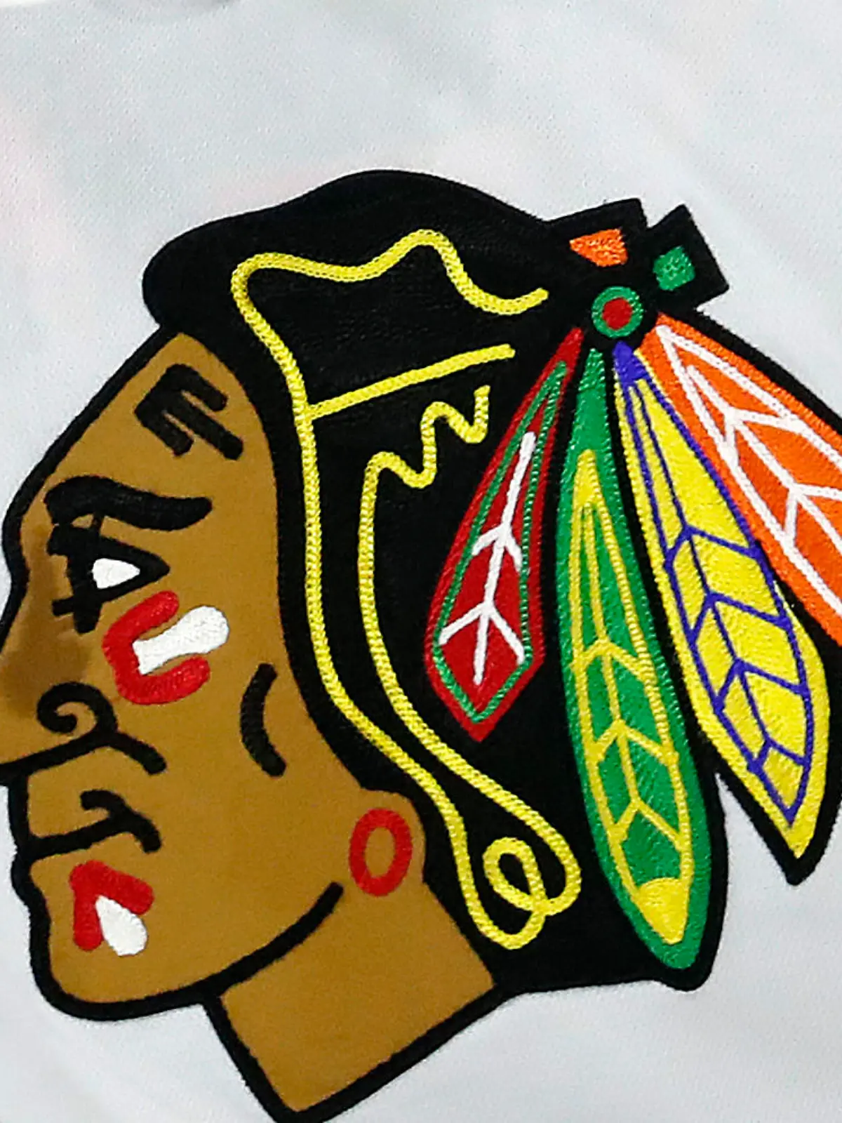 FILE - The Chicago Blackhawks logo is shown on a jersey in Raleigh, N.C., in this May 3, 2021, file photo. The Chicago Blackhawks have hired a former federal prosecutor to conduct an independent review of allegations that a former player was sexually assaulted by a then-assistant coach in 2010. CEO Danny Wirtz announced the move in an internal memo Monday morning, June 28, 2021. (AP Photo/Karl B DeBlaker, File)
