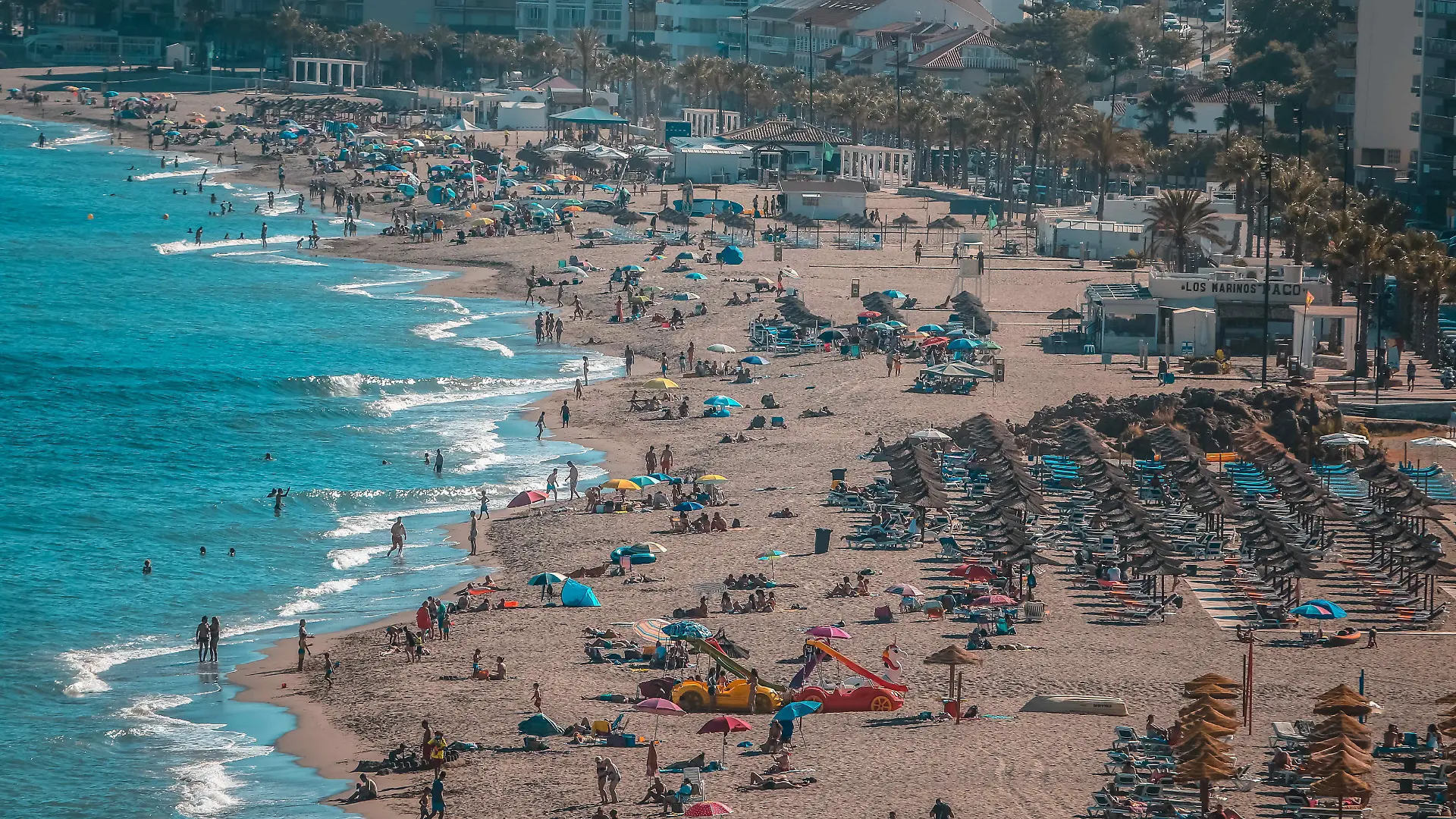 July 21, 2021: July 21, 2021 (Fuengirola, Málaga ) General view of the beaches of Boliches de Fuengirola in a summer sunset and bathers in the sea water. (Credit Image: © Lorenzo Carnero/ZUMA Press Wire