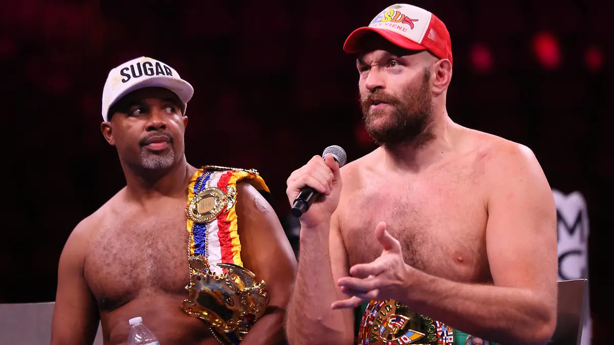 Trainer Sugar Hill Steward and Tyson Fury, both shirtless, appear at the post fight press conference, PK, Pressekonferenz of the Tyson Fury vs Deontay Wilder III 12-round Heavyweight boxing match, at the T-Mobile Arena in Las Vegas, Nevada on Saturday, October 9th, 2021. PUBLICATIONxINxGERxSUIxAUTxHUNxONLY LAV2021100939 JAMESxATOA