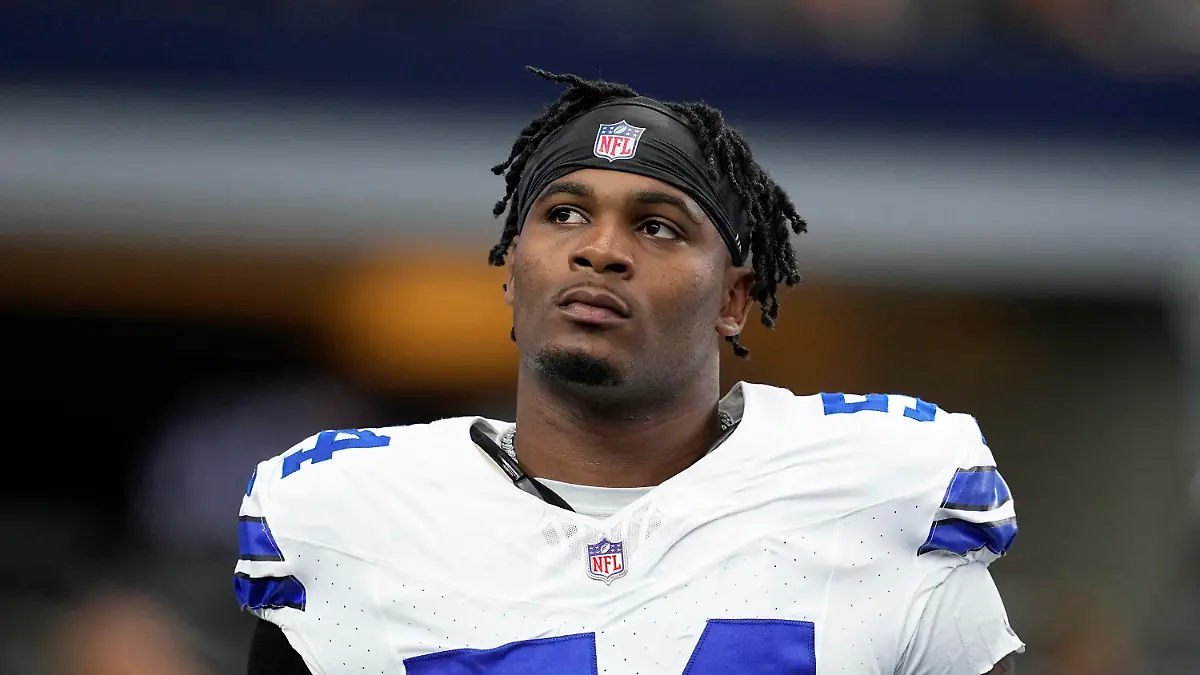 FILE - Dallas Cowboys defensive end Sam Williams warms up before a preseason NFL football game against the Jacksonville Jaguars in Arlington, Texas, Aug. 12, 2022. Williams was arrested on charges of possession of a controlled substance and unlawful carrying of a weapon, police said Wednesday, Aug. 23, 2023. (AP Photo/Tony Gutierrez, File)