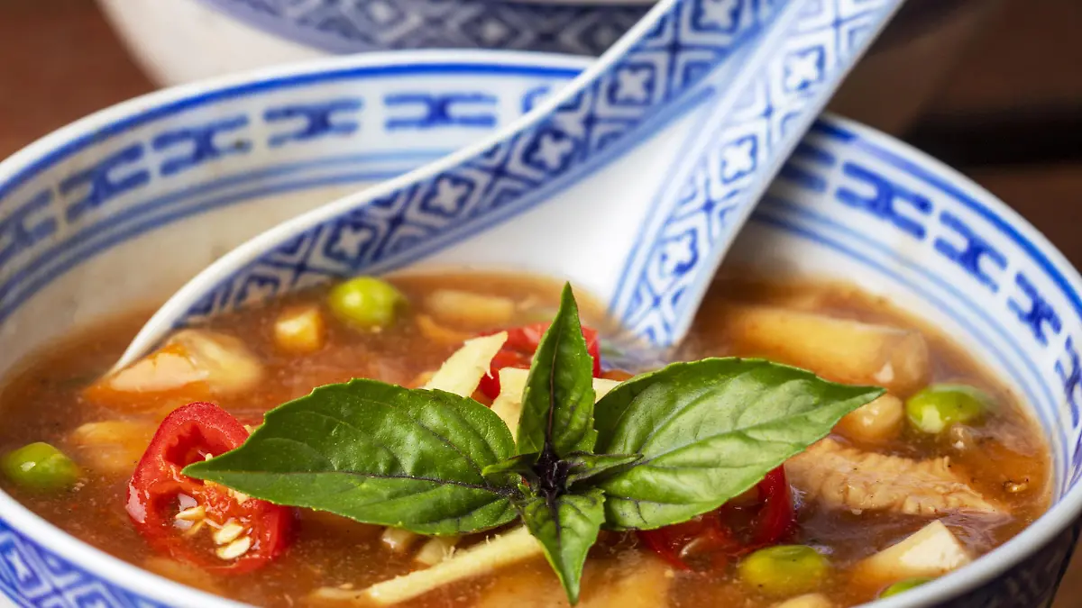 chinese sweet and sour soup on wood