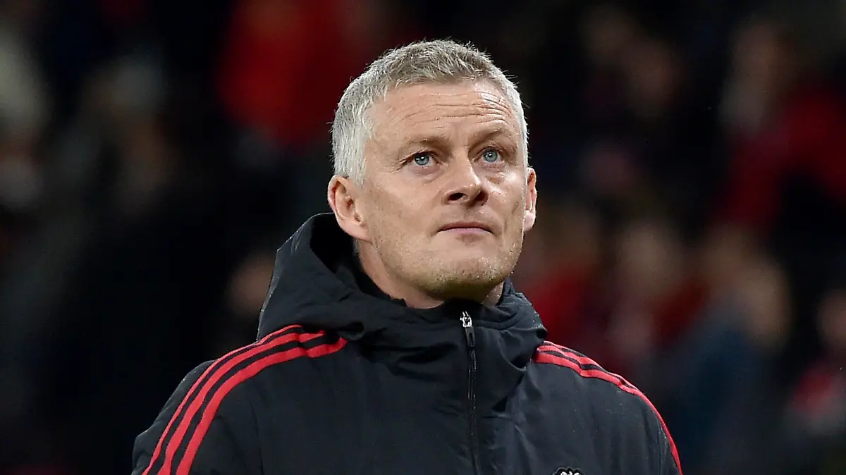 Manchester United's manager Ole Gunnar Solskjaer leaves the field at the end of the English Premier League soccer match between Manchester United and Liverpool at Old Trafford in Manchester, England, Sunday, Oct. 24, 2021. Liverpool won 5-0. (AP Photo/Rui Vieira)