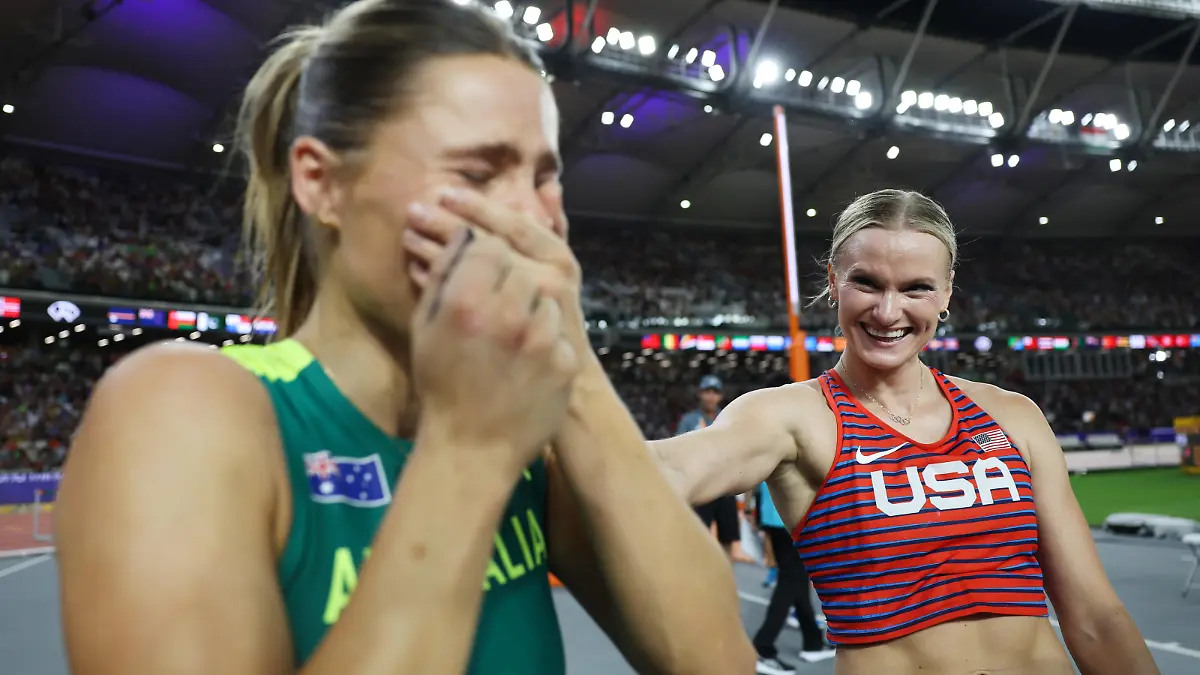 BUDAPEST, HUNGARY - AUGUST 23: Nina Kennedy of Team Australia and Katie Moon of Team United States react after competing in the Women's Pole Vault Final during day five of the World Athletics Championships Budapest 2023 at National Athletics Centre on August 23, 2023 in Budapest, Hungary. Kennedy and Moon decided to share the gold medal. (Photo by Steph Chambers/Getty Images)