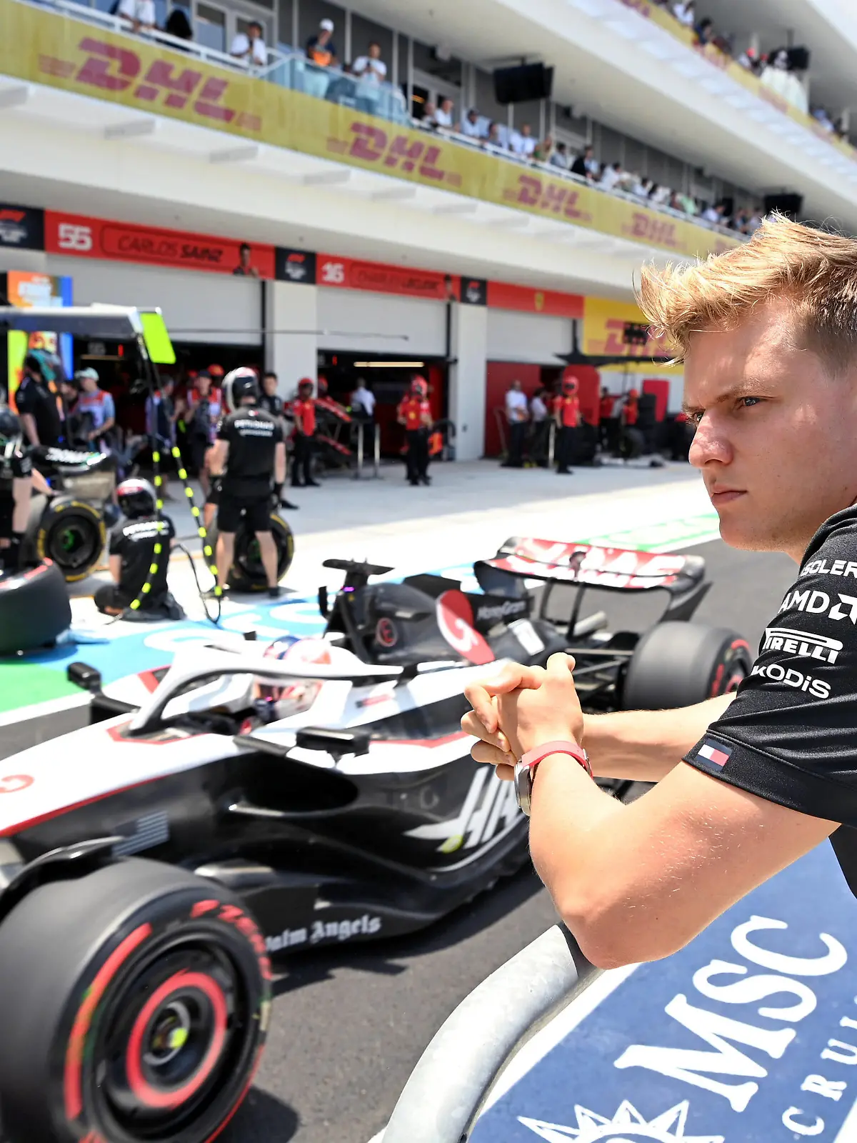 Formula 1 2023: Miami GP MIAMI INTERNATIONAL AUTODROME, UNITED STATES OF AMERICA - MAY 06: Mick Schumacher, Reserve Driver, Mercedes-AMG, watches as Kevin Magnussen, Haas VF-23, passes in the pit lane during the Miami GP at Miami International Autodrome on Saturday May 06, 2023 in Miami, United States of America. Photo by Mark Sutton / Sutton Images Images PUBLICATIONxINxGERxSUIxAUTxHUNxONLY GP2305_123457MS3_2795
