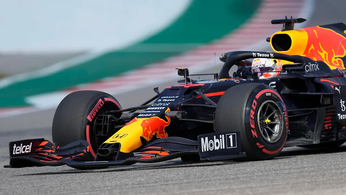 Red Bull driver Max Verstappen, of the Netherlands, drives into a turn during a practice session for the F1 US Grand Prix auto race at the Circuit of the Americas, Friday, Oct. 22, 2021, in Austin, Texas. (AP Photo/Nick Didlick)