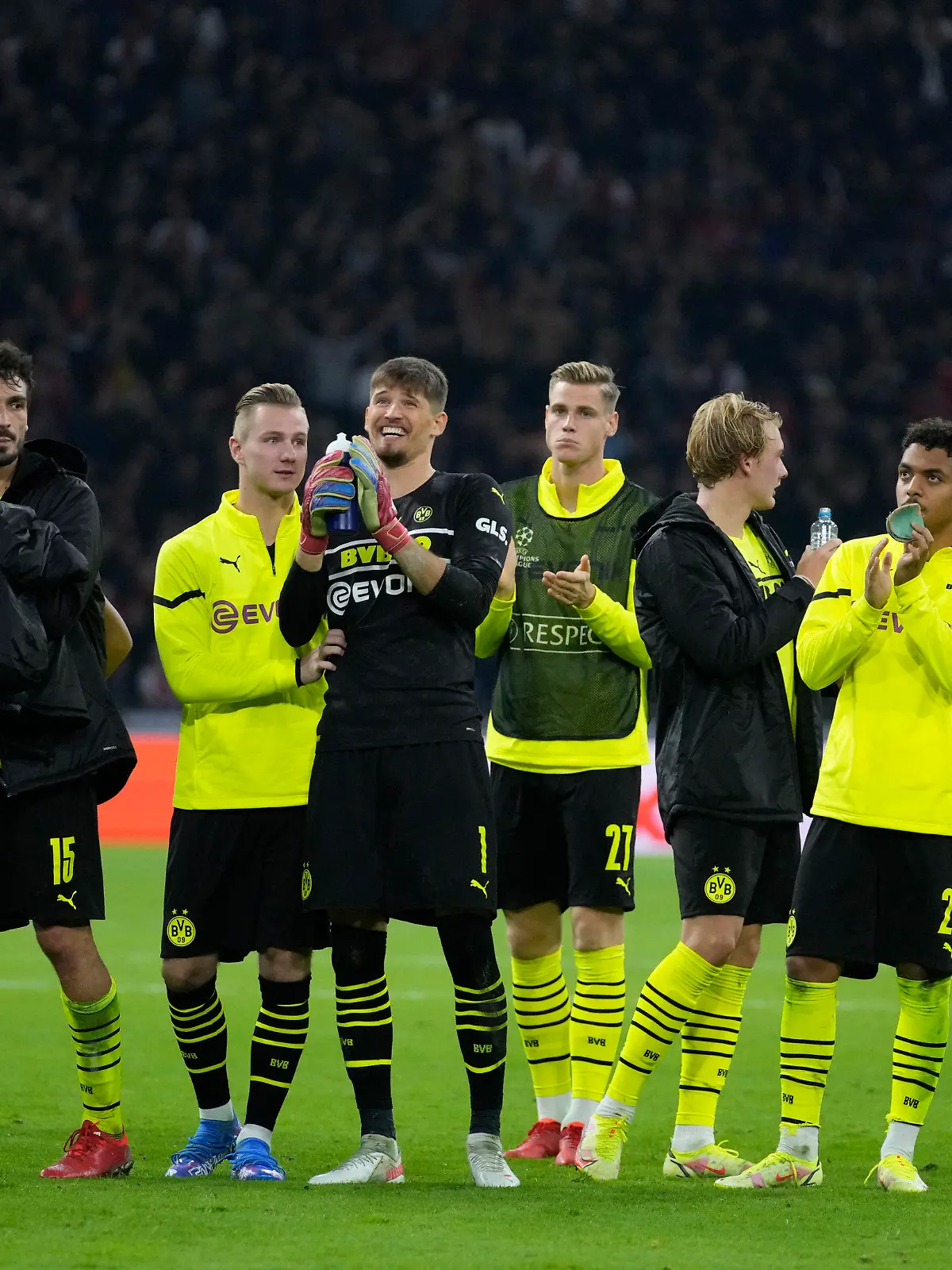 Dortmund players applaud to supporters at the end of the Champions League group C soccer match between Ajax and Borussia Dortmund at the Johan Cruyff ArenA in Amsterdam, Netherlands, Tuesday, Oct. 19, 2021. (AP Photo/Peter Dejong)