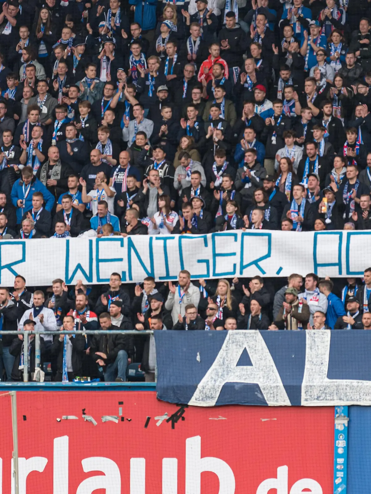 Rostock, Deutschland 17. Oktober 2021: 2. BL - 2021/2022 - FC Hansa Rostock vs. SV Sandhausen "Einer weniger, ACAB" Banner auf der Südtribüne /// DFB regulations prohibit any use of photographs as image sequences and/or quasi-video. ///