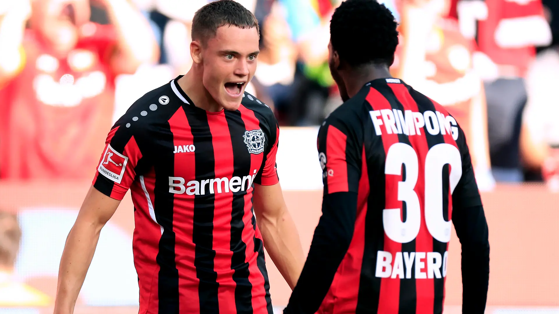 WIRTZ Florian Team Bayer 04 Leverkusen jubelt nach seinem Tor zum 1 : 0 Endstand mit FRIMPONG Jeremie 1.Fussball BL DFL Saison 2021 _ 2022 Spiel Bayer 04 Leverkusen - Mainz 1 : 0 am 25. 09. 2021 in Leverkusen DFL REGULATIONS PROHIBIT ANY USE OF PHOTOGRAPHS as IMAGE SEQUENCES and/or QUASI-VIDEO *** WIRTZ Florian Team Bayer 04 Leverkusen cheers after his goal to 1 0 final score with FRIMPONG Jeremie 1 Football BL DFL Season 2021 2022 Match Bayer 04 Leverkusen Mainz 1 0 on 25 09 2021 in Leverkusen DFL REGULATIONS PROHIBIT ANY USE OF PHOTOGRAPHS as IMAGE SEQUENCES and or QUASI VIDEO