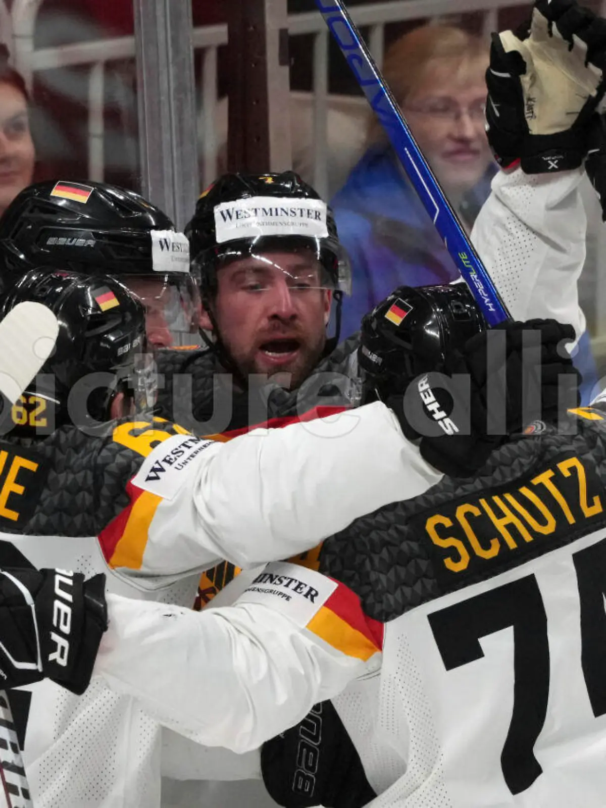 Maximilian Kastner of Germany centre celebrates a goal with teammates during the quater final match between Germany and Switzerland at the ice hockey world championship in Riga, Latvia, Thursday, May 25, 2023. (AP Photo/Roman Koksarov)