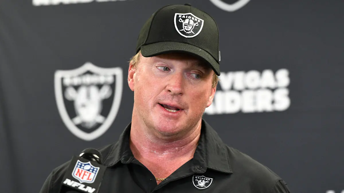 FILE - In this Sept. 19, 2021, file photo, Las Vegas Raiders head coach Jon Gruden meets with the media following an NFL football game against the Pittsburgh Steelers in Pittsburgh. Gruden is out as coach of the Raiders after emails he sent before being hired in 2018 contained racist, homophobic and misogynistic comments. A person familiar with the decision said Gruden is stepping down after The New York Times reported that Gruden frequently used misogynistic and homophobic language directed at Commissioner Roger Goodell and others in the NFL. (AP Photo/Don Wright, File)
