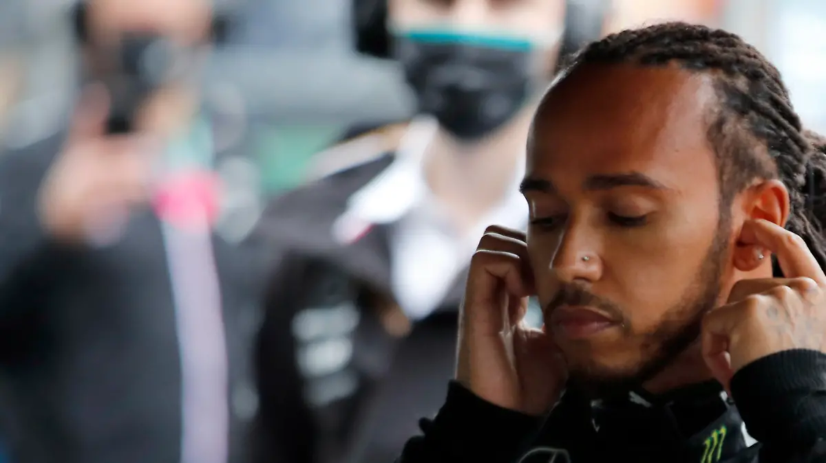 Mercedes driver Lewis Hamilton of Britain prepares for the Turkish Formula One Grand Prix at the Intercity Istanbul Park circuit in Istanbul, Turkey, Sunday, Oct. 10, 2021. (Umit Bektas/Pool via AP)