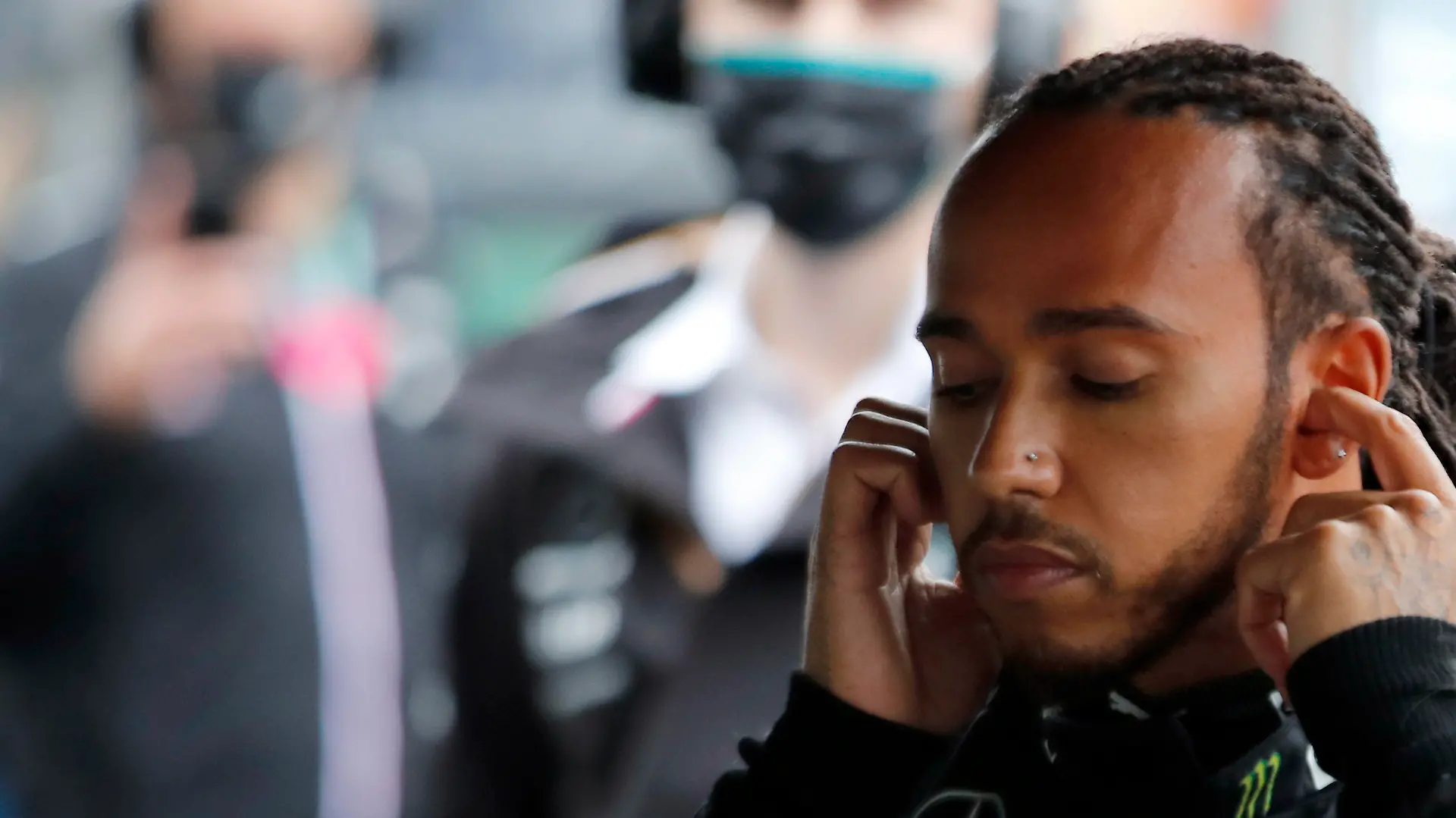 Mercedes driver Lewis Hamilton of Britain prepares for the Turkish Formula One Grand Prix at the Intercity Istanbul Park circuit in Istanbul, Turkey, Sunday, Oct. 10, 2021. (Umit Bektas/Pool via AP)