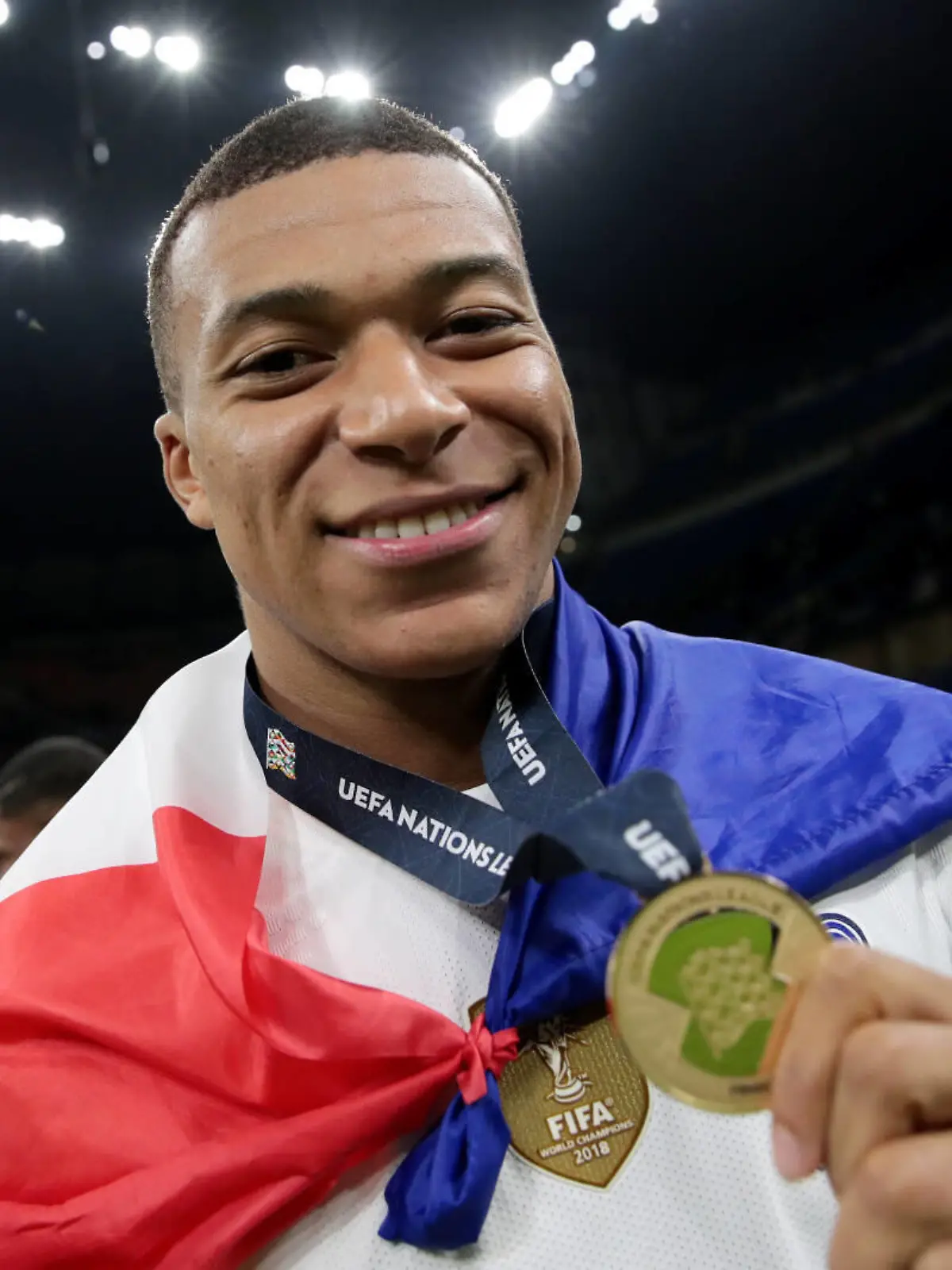  MILAN, ITALY - OCTOBER 10: Kylian Mbappe of France celebrates with their winners medal following the UEFA Nations League 2021 Final match between Spain and France at San Siro Stadium on October 10, 2021 in Milan, Italy. Photo by Emilio Andreoli - UEFA/UEFA via Getty Images/Insidefoto/Insidefoto insidefoto