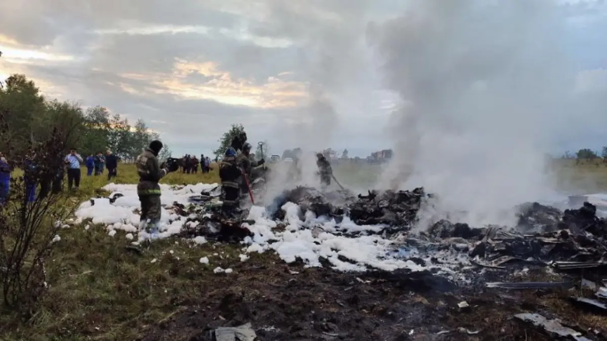 RUSSIA, TVER REGION - AUGUST 23, 2023: Battling a fire at the crash site of an Embraer ERG 135 plane (registration RA-02795). On August 23, the jet crashed in Tver Region on a flight from Moscow's Sheremetyevo Airport to St Petersburg. Russian Investigative Committee/TASS / action press
