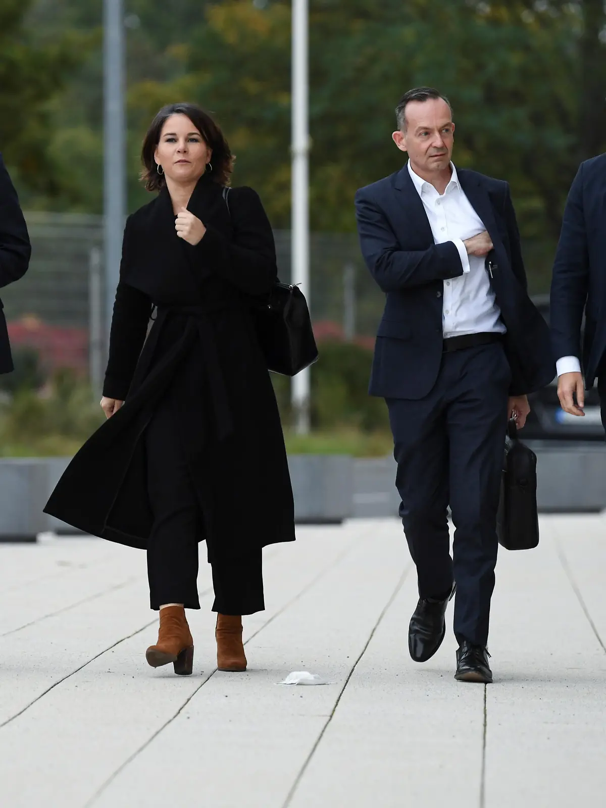 Greens party co-leaders Robert Habeck and Annalena Baerbock arrive together with Free Democratic Party (FDP) secretary general Volker Wissing and FDP leader Christian Lindner to a meeting for exploratory talks for a possible new government coalition with the Social Democratic Party SPD in Berlin, Germany, October 11, 2021. REUTERS/Annegret Hilse