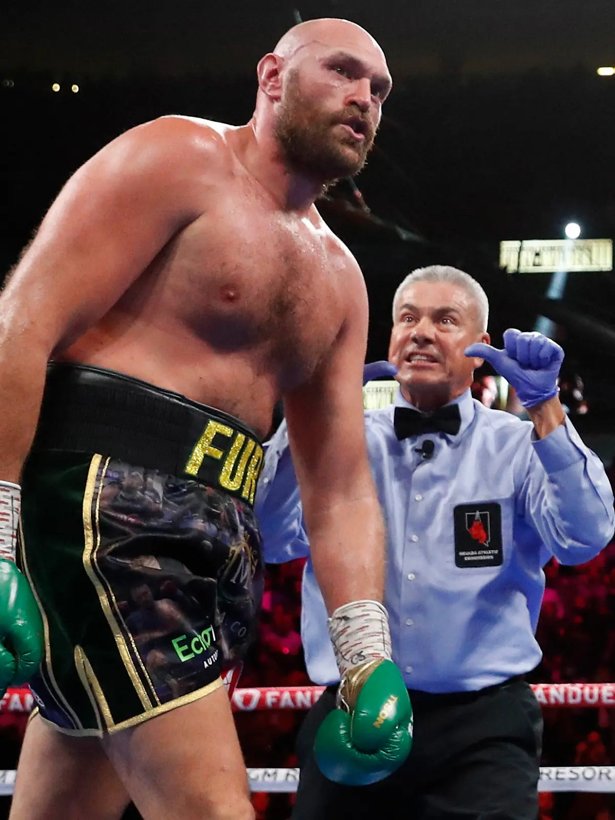 Boxing - Tyson Fury v Deontay Wilder - WBC Heavyweight Title - T-Mobile Arena, Las Vegas, Nevada, U.S. - October 9, 2021 Tyson Fury is given the count REUTERS/Steve Marcus