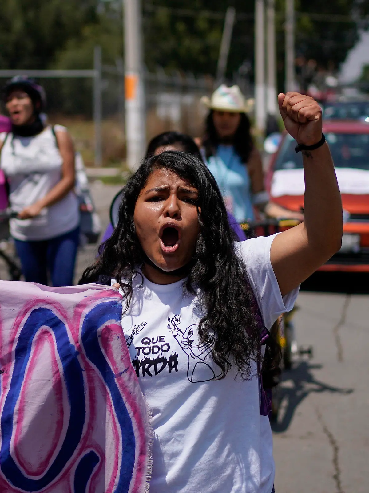 FILE - Roxana Ruiz shouts slogans during a march in memory of Diana Velazquez, who was making a call outside her home in 2017 when she was disappeared, raped and killed, in Chimalhuacan, State of Mexico, Mexico, July 2, 2022. Ruiz, who killed a man defending herself when he attacked and raped her in 2021 was sentenced to more than six years in prison, a decision her legal defense called “discriminatory” and vowed to appeal Tuesday, May 16, 2023.(AP Photo/Eduardo Verdugo, File)
