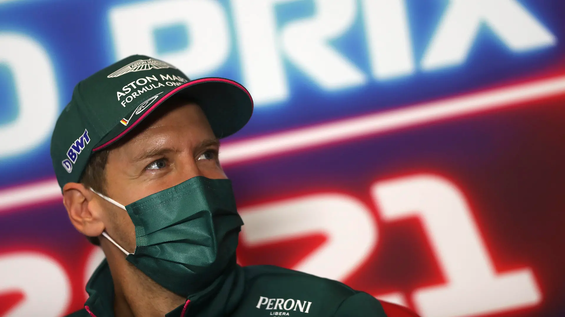 Aston Martin driver Sebastian Vettel of Germany answers a question during a press conference ahead of Sunday's Formula One Turkish Grand Prix at the Intercity Istanbul Park circuit in Istanbul, Turkey, Thursday, Oct. 7, 2021. (Sedat Suna/Pool Photo via AP)