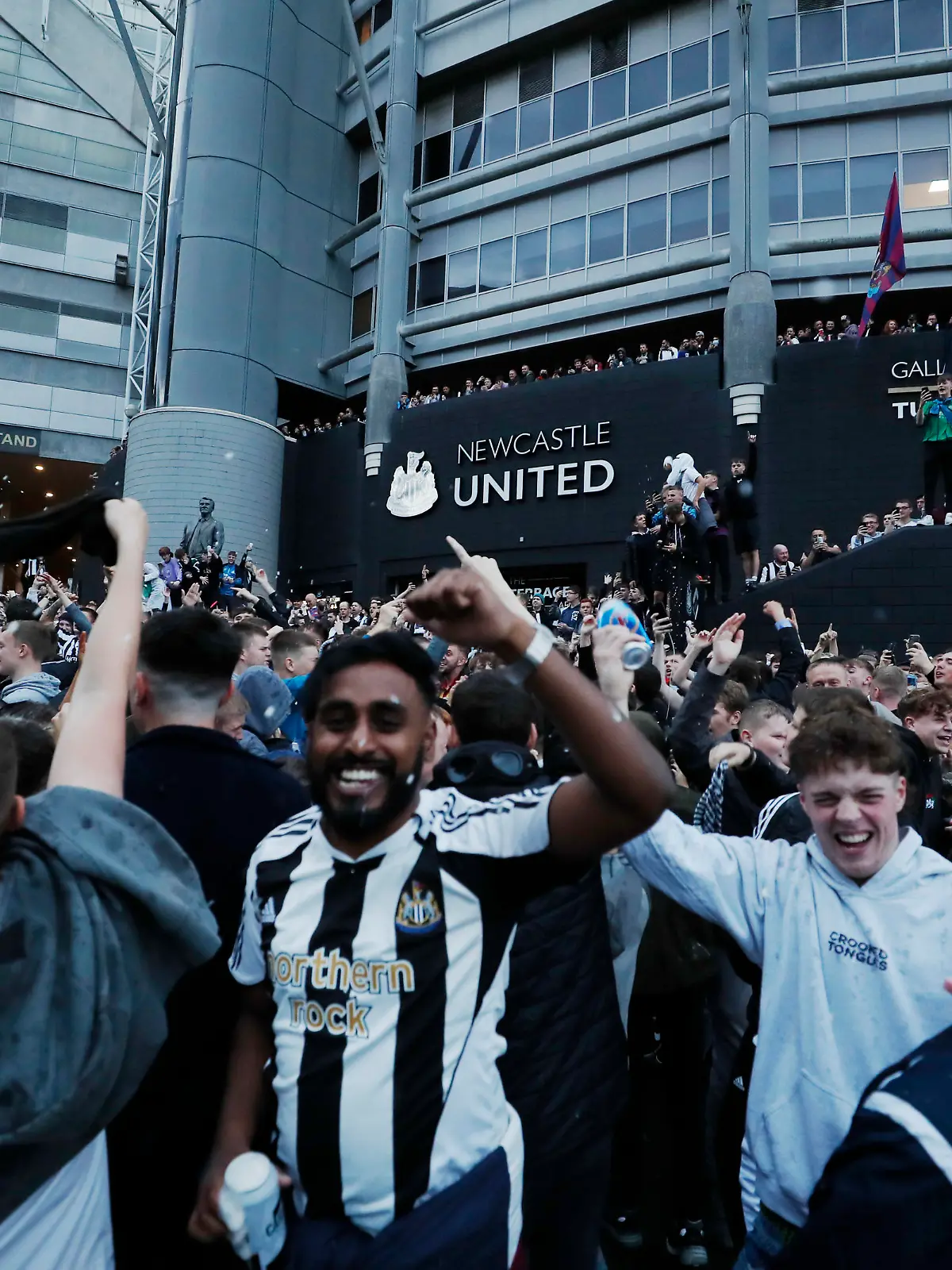 Soccer Football - Newcastle United Takeover - St James' Park, Newcastle, Britain - October 7, 2021 Fans react outside the stadium after Newcastle United announced takeover Action Images via Reuters/Lee Smith