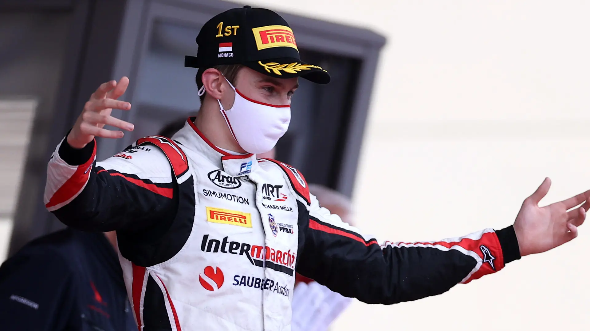 MONTE-CARLO, MONACO - MAY 22: Race winner Theo Pourchaire of France and ART Grand Prix celebrates on the podium during the Feature Race of Round 2:Monte Carlo of the Formula 2 Championship at Circuit de Monaco on May 22, 2021 in Monte-Carlo, Monaco. (Photo by Lars Baron/Getty Images)