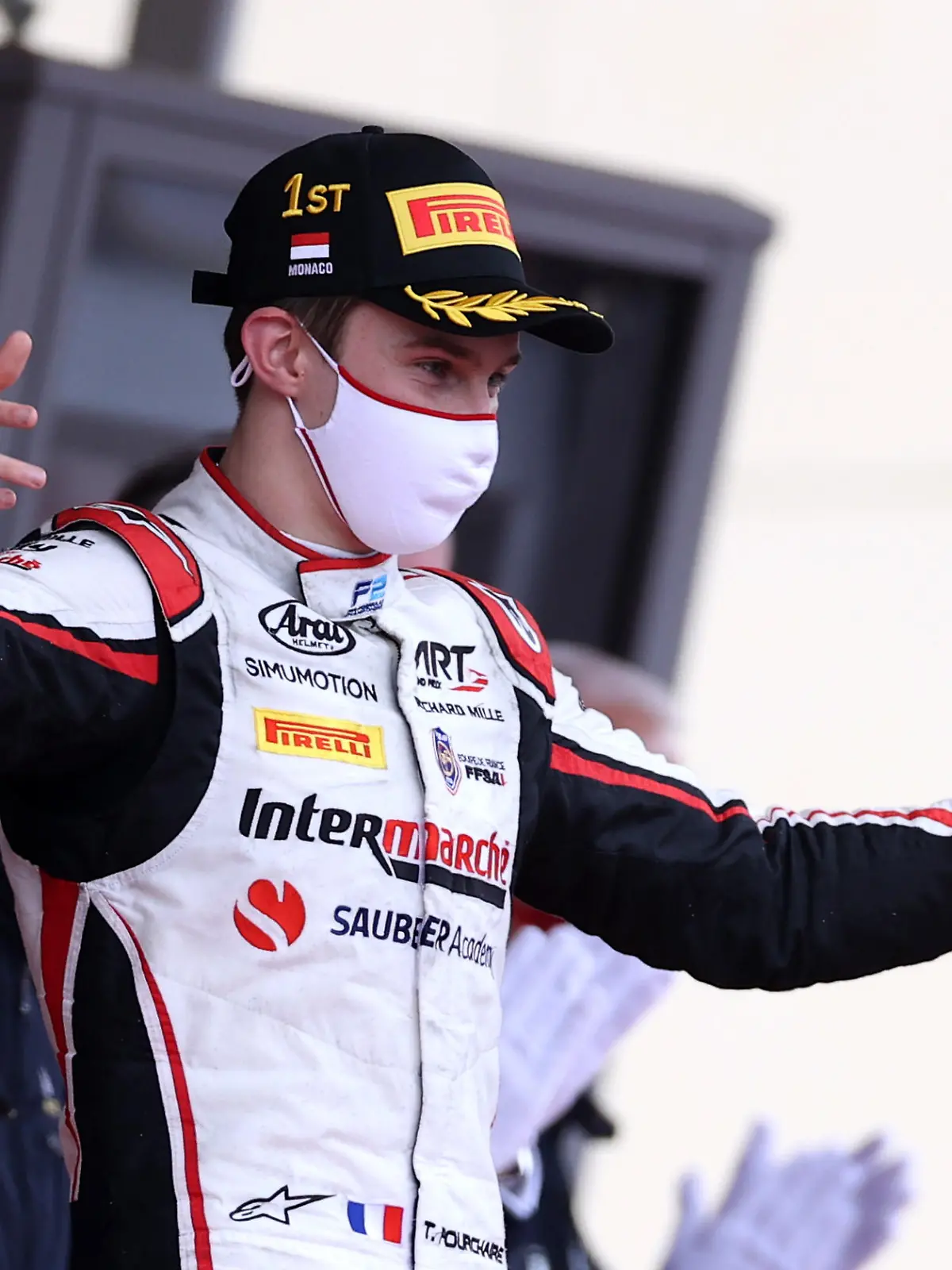 MONTE-CARLO, MONACO - MAY 22: Race winner Theo Pourchaire of France and ART Grand Prix celebrates on the podium during the Feature Race of Round 2:Monte Carlo of the Formula 2 Championship at Circuit de Monaco on May 22, 2021 in Monte-Carlo, Monaco. (Photo by Lars Baron/Getty Images)