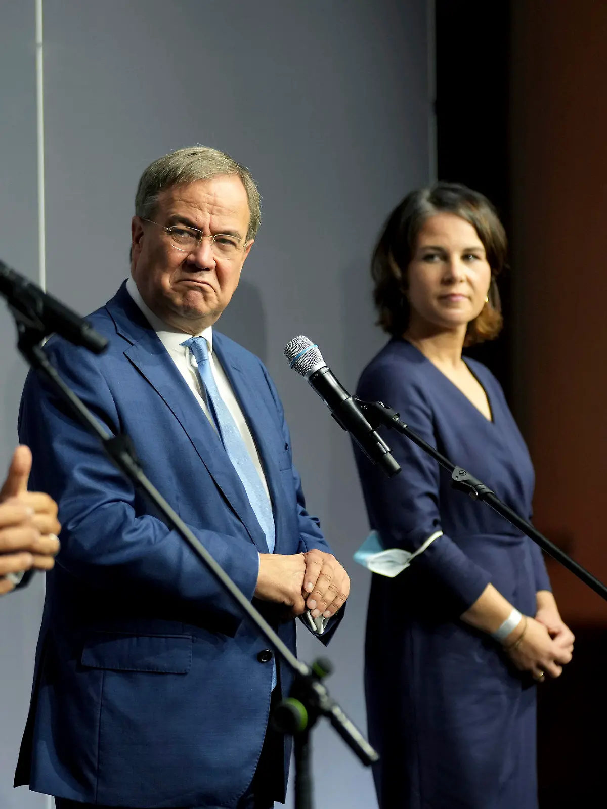From left, Robert Habeck, co-chairman of the German Green party (Die Gruenen), Armin Laschet, chairman of the German Christian Democratic Party (CDU), Annalena Baerbock, co-chairwoman of the German Green party (Die Gruenen), and Markus Soeder, chairman of the German Christian Social Union (CSU), attend a statement after a meeting in Berlin, Germany, Tuesday, Oct. 5, 2021. A delegation from outgoing Chancellor Angela Merkel's center-right Union bloc met with the environmentalist Greens on Tuesday for exploratory talks on the formation of a new German government. (AP Photo/Michael Sohn)