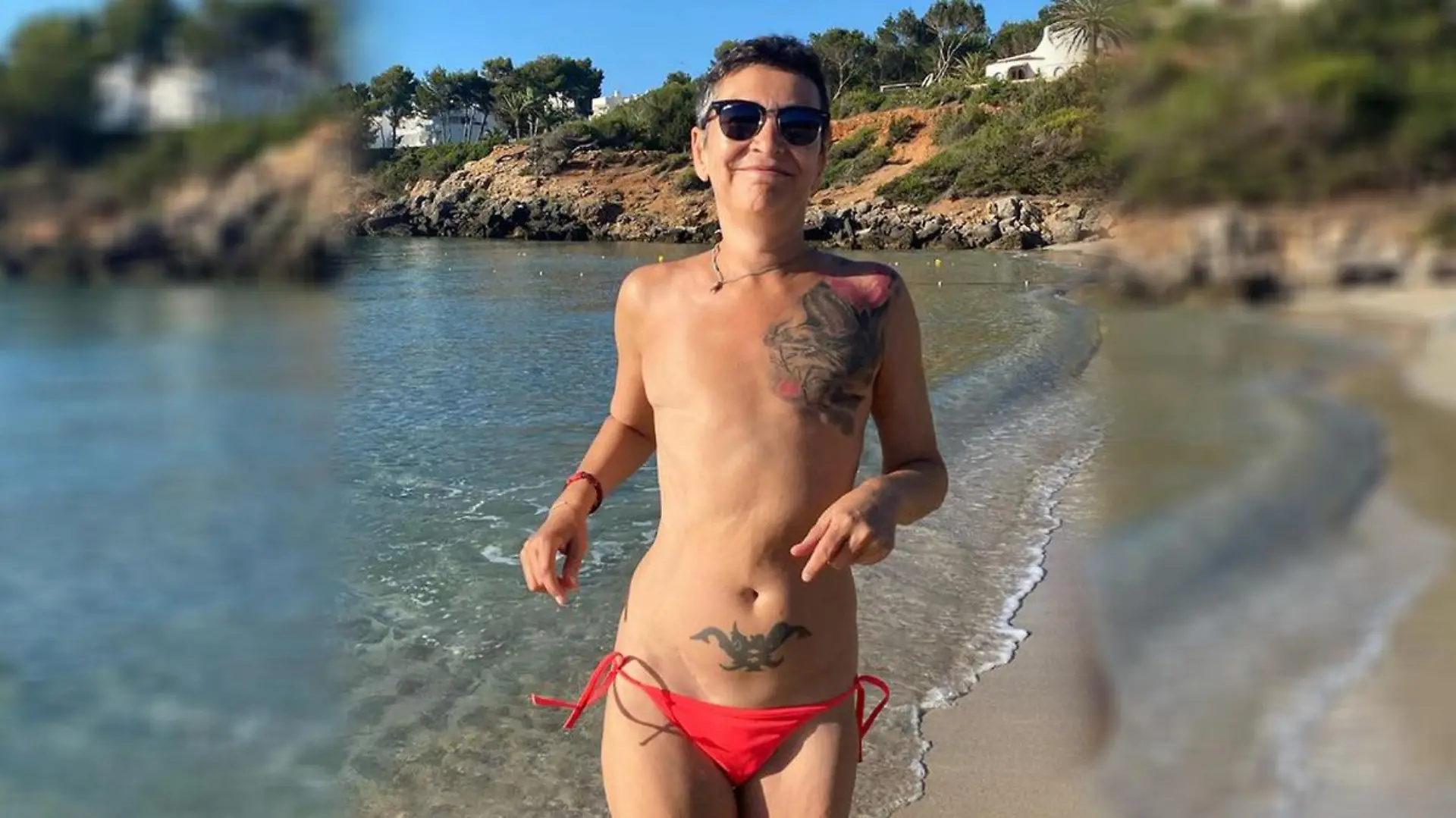 Uta Melle. Sie trägt am Strand selbstbewusst nur ein Biki-Höschen.