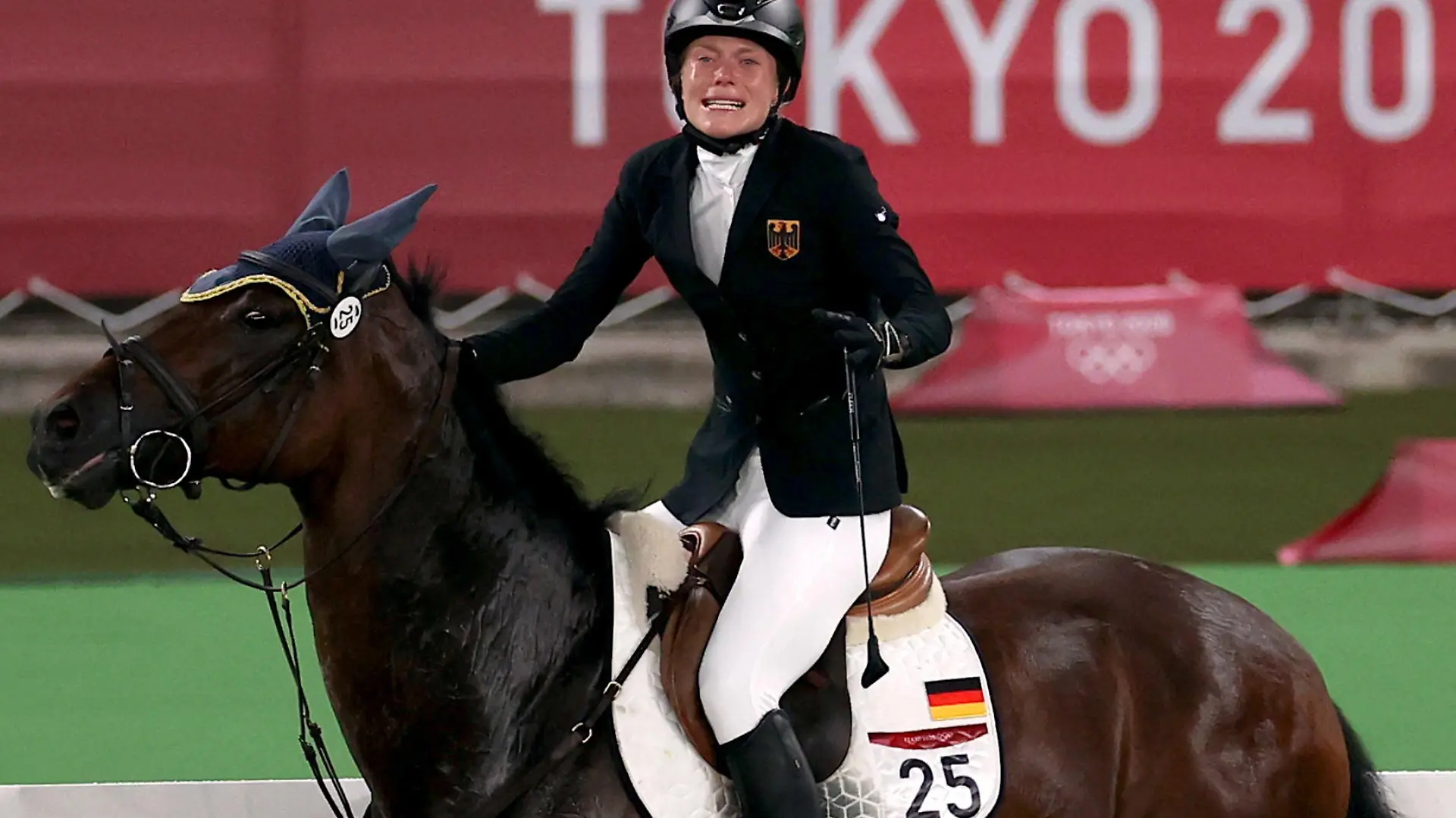 Tokyo 2020 Olympics - Modern Pentathlon - Women's Riding - Tokyo Stadium - Tokyo, Japan - August 6, 2021. Annika Schleu of Germany reacts before being eliminated REUTERS/Ivan Alvarado