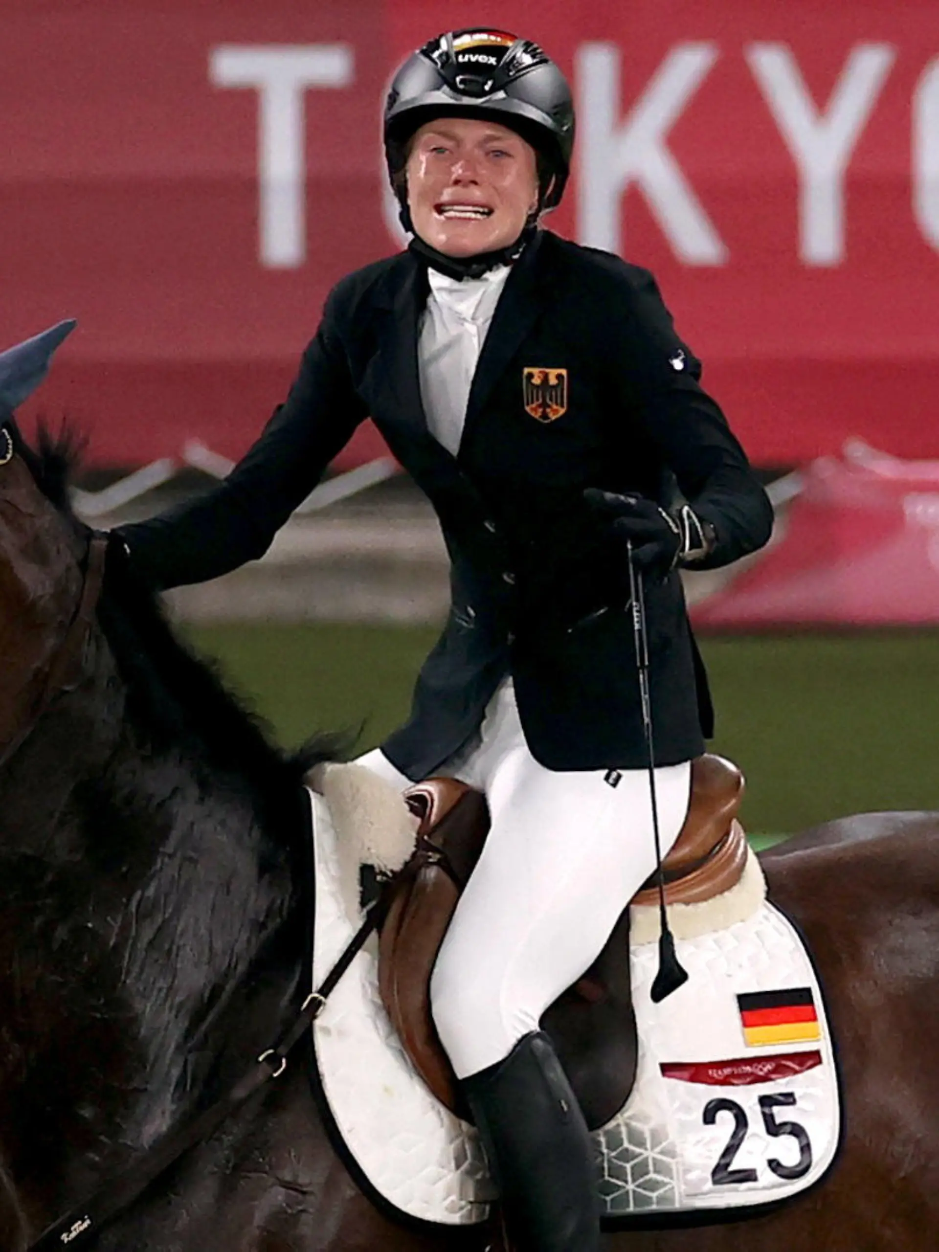 Tokyo 2020 Olympics - Modern Pentathlon - Women's Riding - Tokyo Stadium - Tokyo, Japan - August 6, 2021. Annika Schleu of Germany reacts before being eliminated REUTERS/Ivan Alvarado