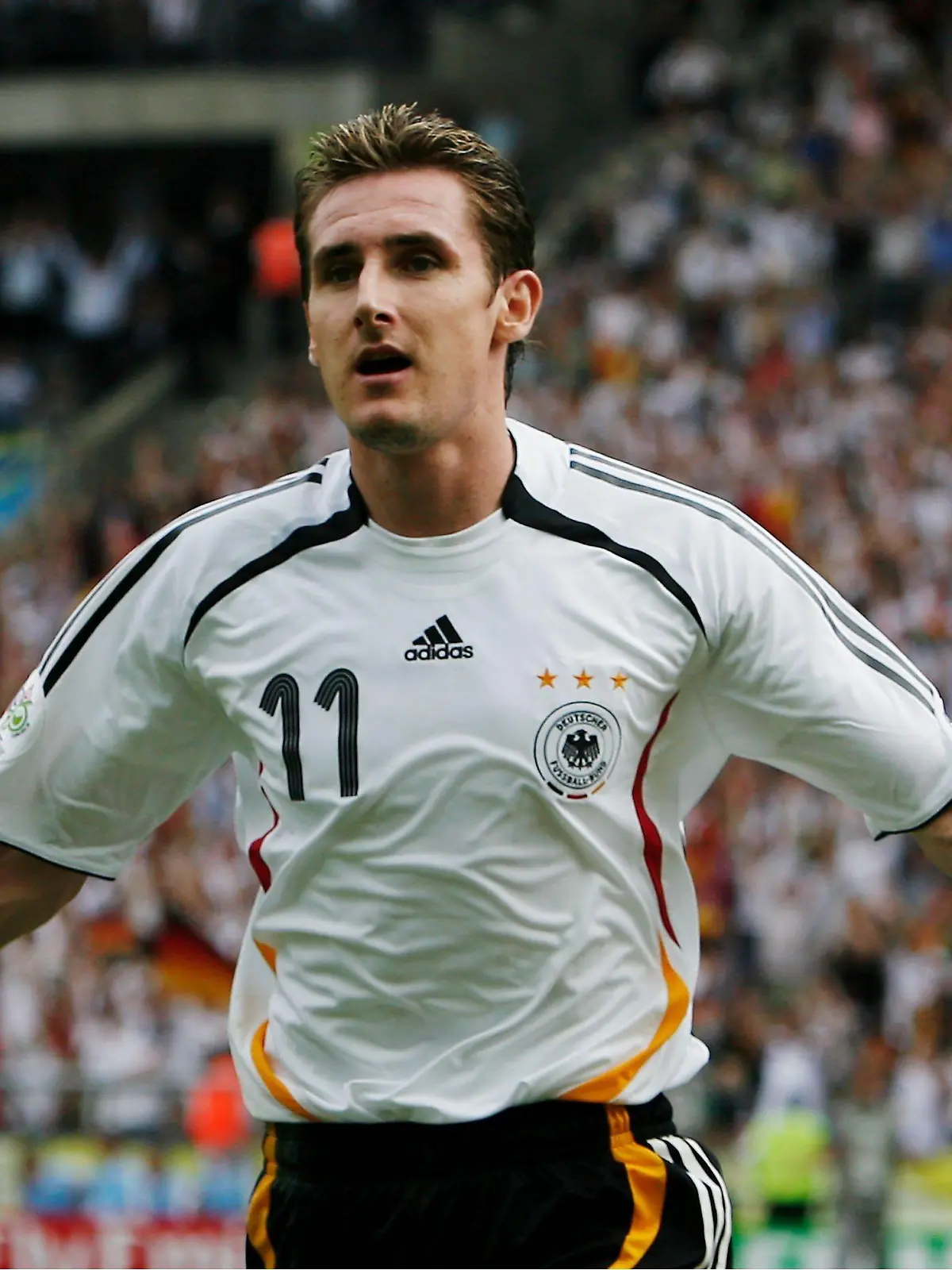 BERLIN - JUNE 20:  Miroslav Klose of Germany celebrates scoring his team's second goal during the FIFA World Cup Germany 2006 Group A match between Ecuador and Germany played at the Olympic Stadium on June 20, 2006 in Berlin, Germany.  (Photo by Lars Baron/Bongarts/Getty Images)