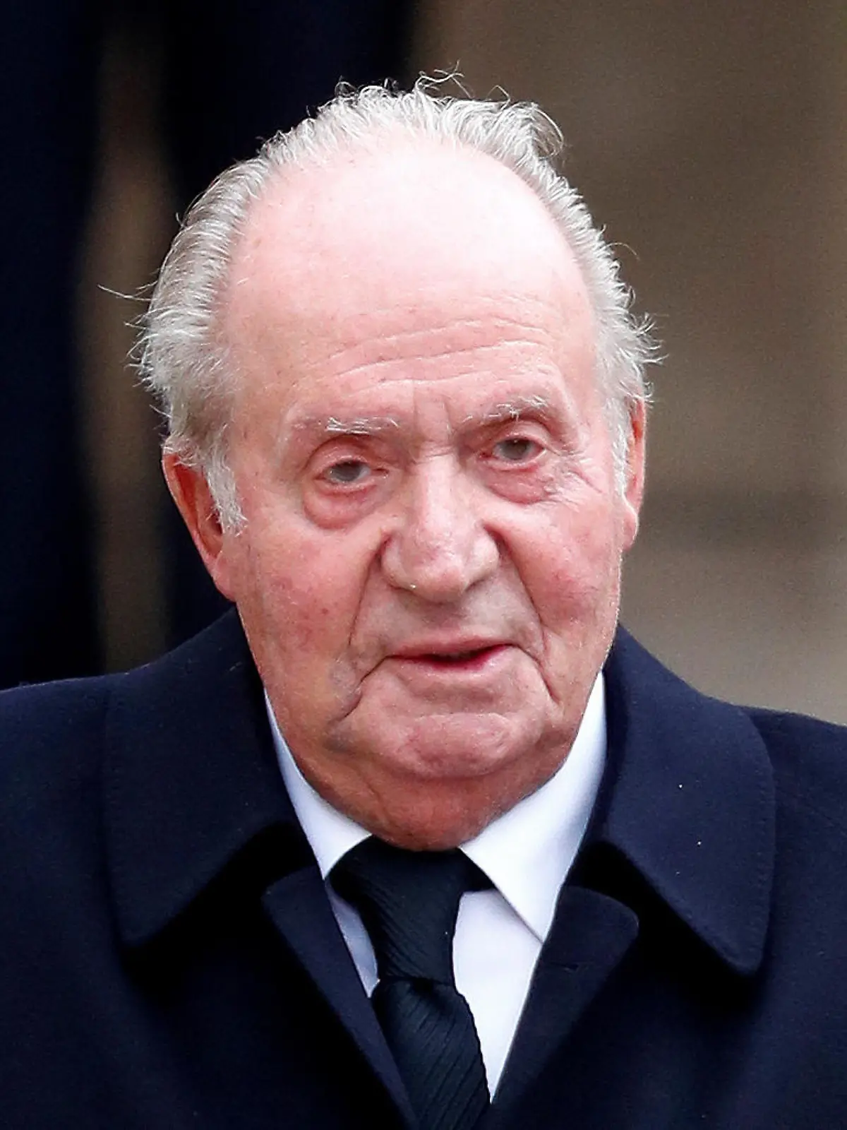 FILE PHOTO: Spain's former king, Juan Carlos, leaves after attending the funeral ceremony of Luxembourg's Grand Duke Jean at the Notre-Dame Cathedral in Luxembourg, May 4, 2019. REUTERS/Francois Lenoir/File Photo