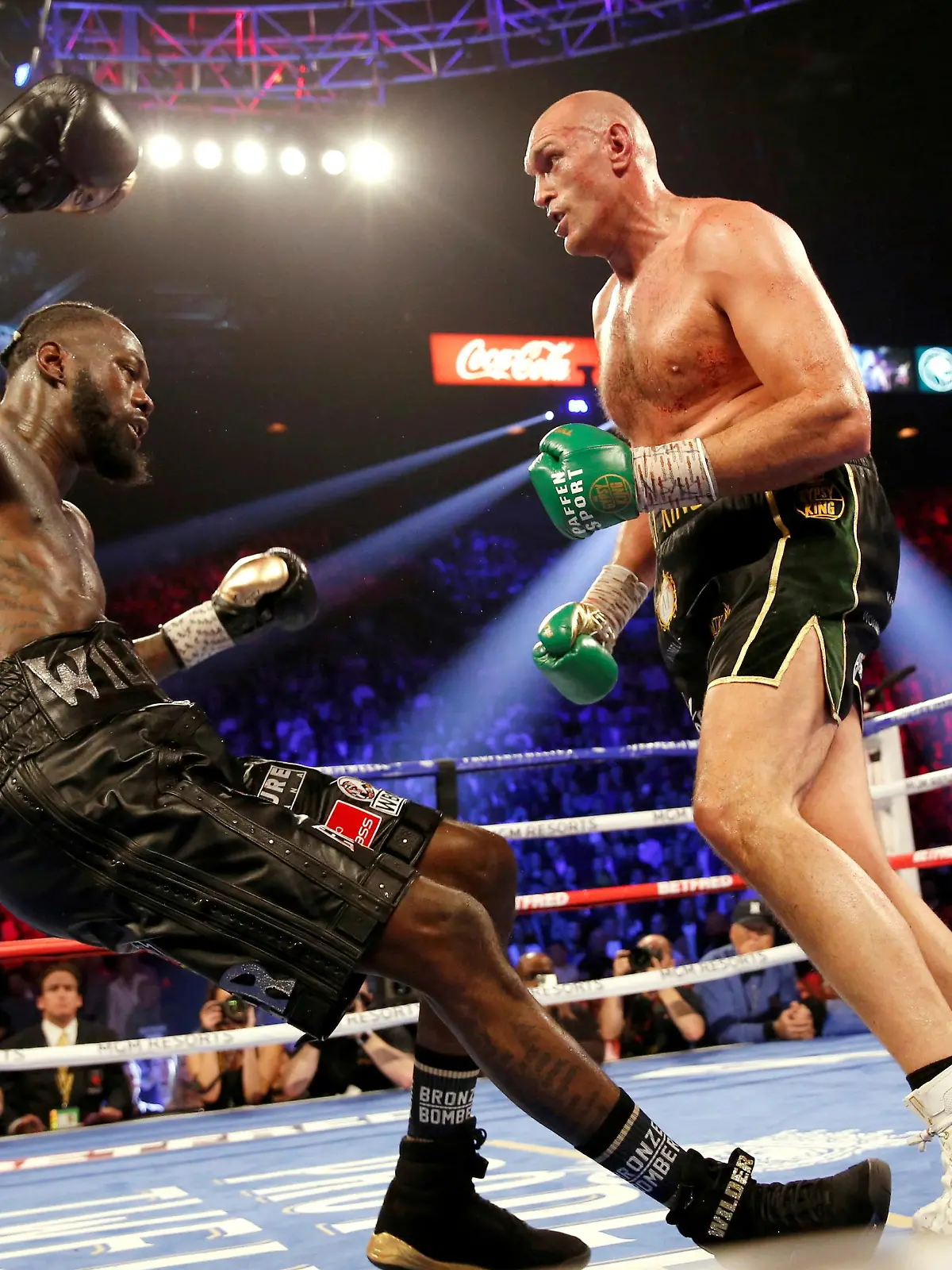 FILE PHOTO: Boxing - Deontay Wilder v Tyson Fury - WBC Heavyweight Title - The Grand Garden Arena at MGM Grand, Las Vegas, United States - February 22, 2020 Tyson Fury knocks down Deontay Wilder during the fight REUTERS/Steve Marcus/File Photo