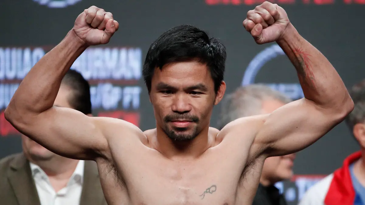 ARCHIV - 19.07.2019, USA, Las Vegas: Manny Pacquiao, Boxer von den Philippinen, posiert beim Wiegen. Der philippinische Boxer Manny Pacquiao kandidiert für das Präsidentenamt in seinem Land. (zu dpa «Box-Legende Pacquaio will Präsident der Philippinen werden») Foto: John Locher/AP/dpa +++ dpa-Bildfunk +++