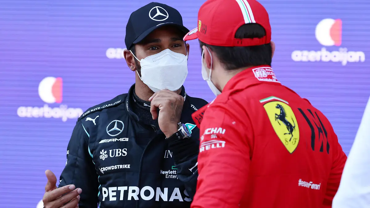 Formula 1 2021: Azerbaijan GP BAKU CITY CIRCUIT, AZERBAIJAN - JUNE 05: Sir Lewis Hamilton, Mercedes, talks with pole man Charles Leclerc, Ferrari, in Parc Ferme during the Azerbaijan GP at Baku City Circuit on Saturday June 05, 2021 in Baku, Azerbaijan. Photo by Steve Etherington / LAT Images Images PUBLICATIONxINxGERxSUIxAUTxHUNxONLY GP2106_123109SNE43231