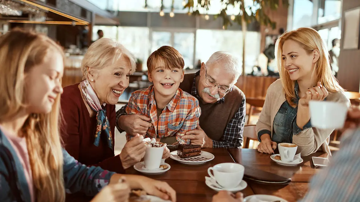 Close up of a happy family enjoying time together in a cafe